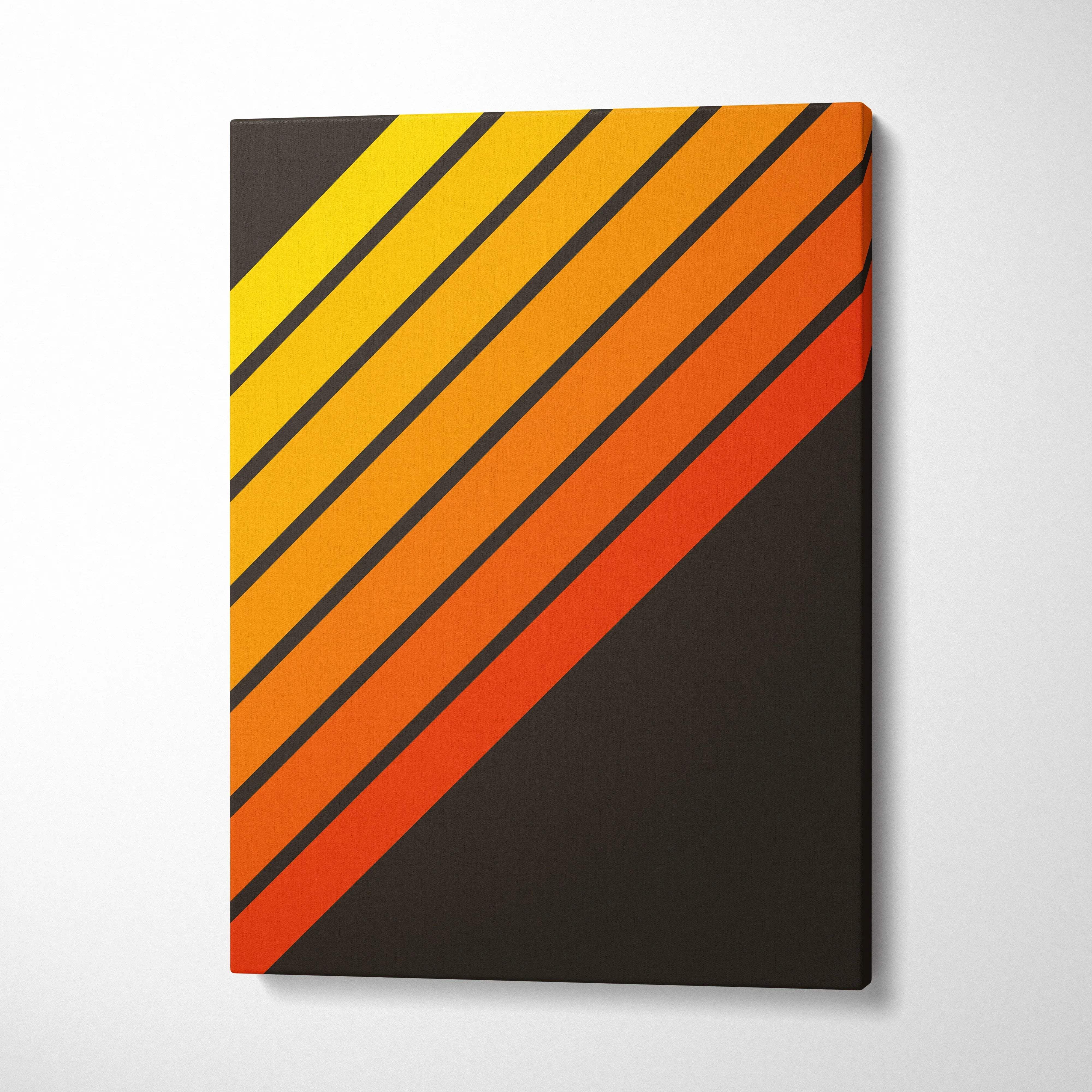 Bold diagonal retro stripes canvas wall art in yellow orange on dark brown