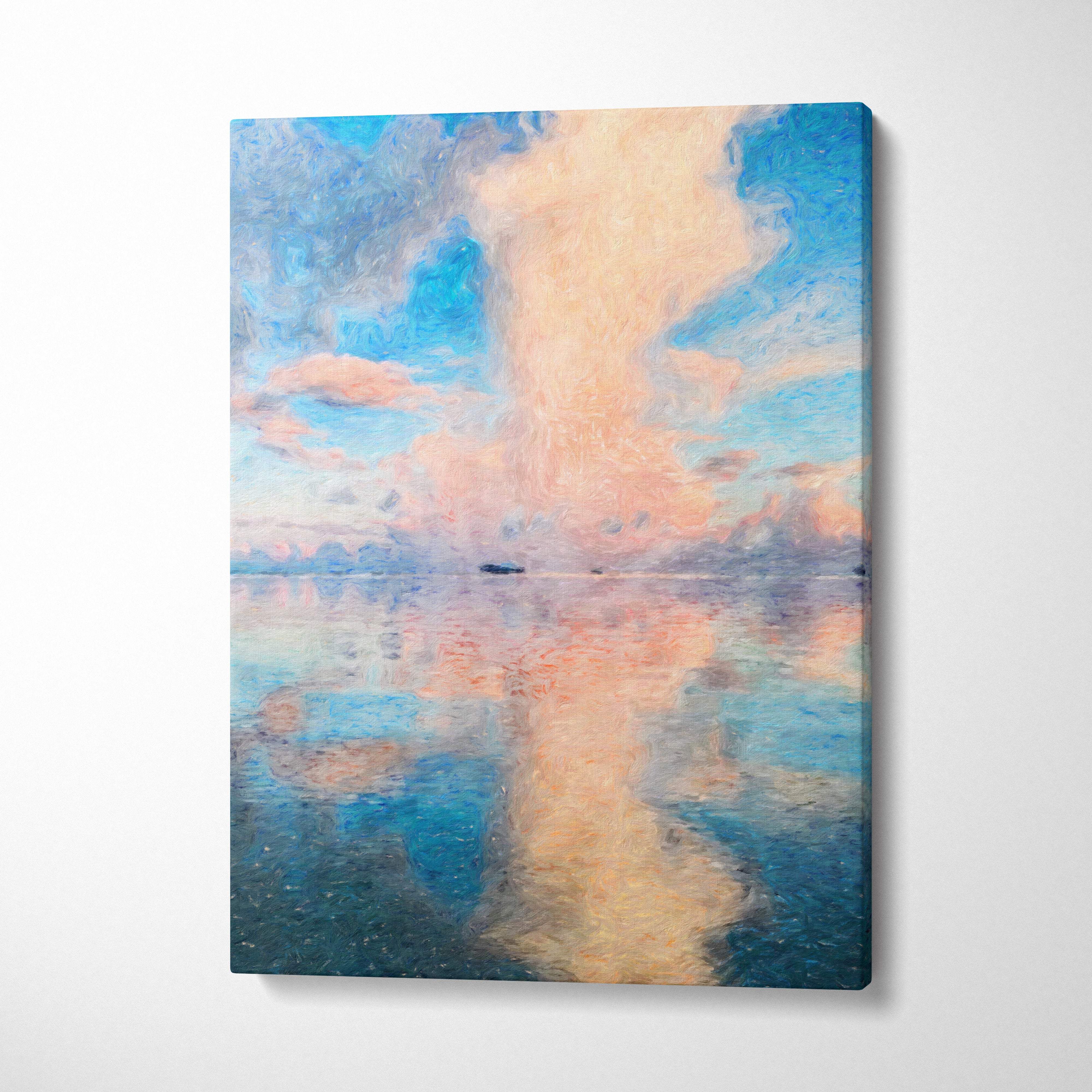 Rectangular canvas print of a soft pastel seascape with swirling blue and peach clouds reflected in calm water