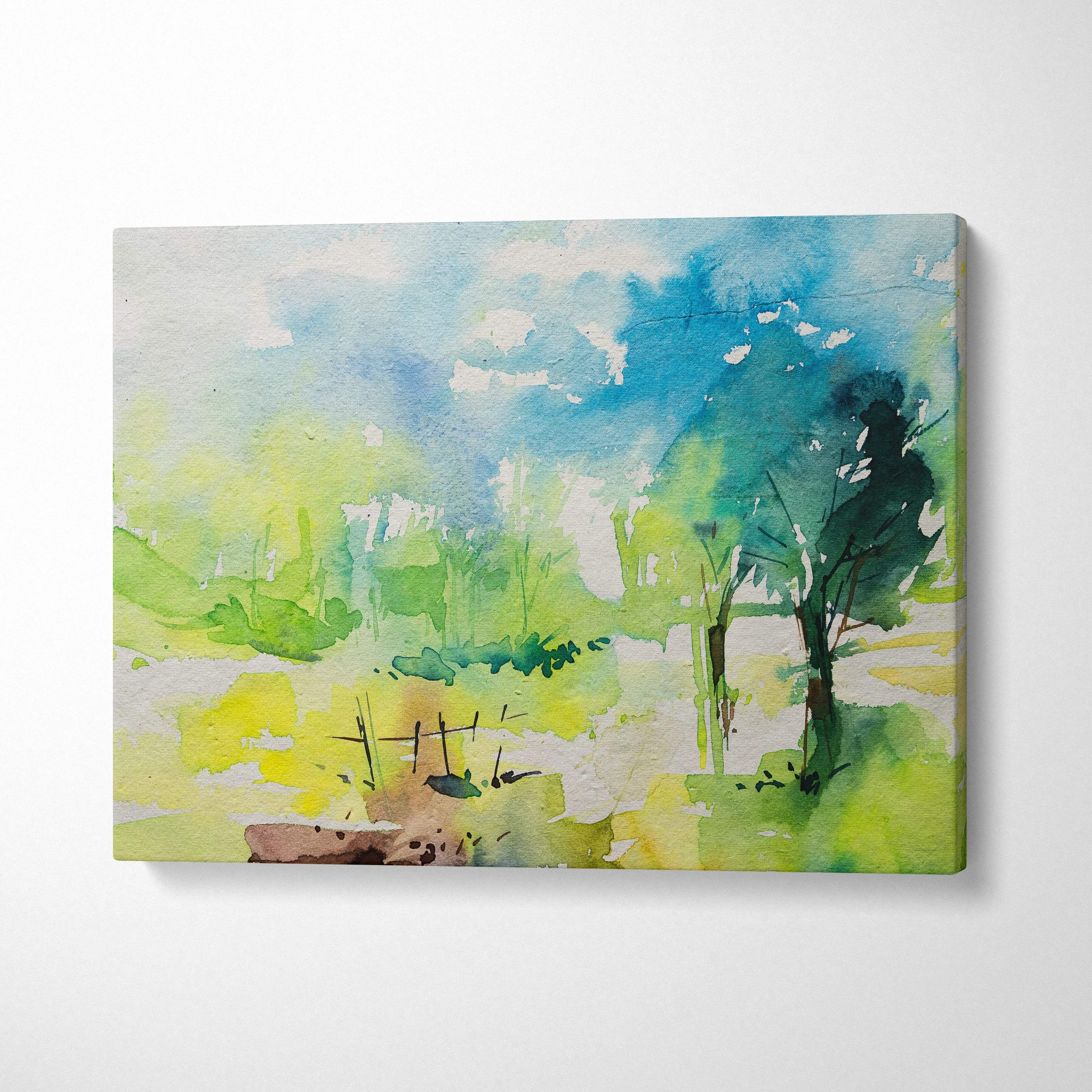 Pastel watercolor landscape canvas wall art in soft blues greens yellows with abstract tree silhouettes and loose brush strokes