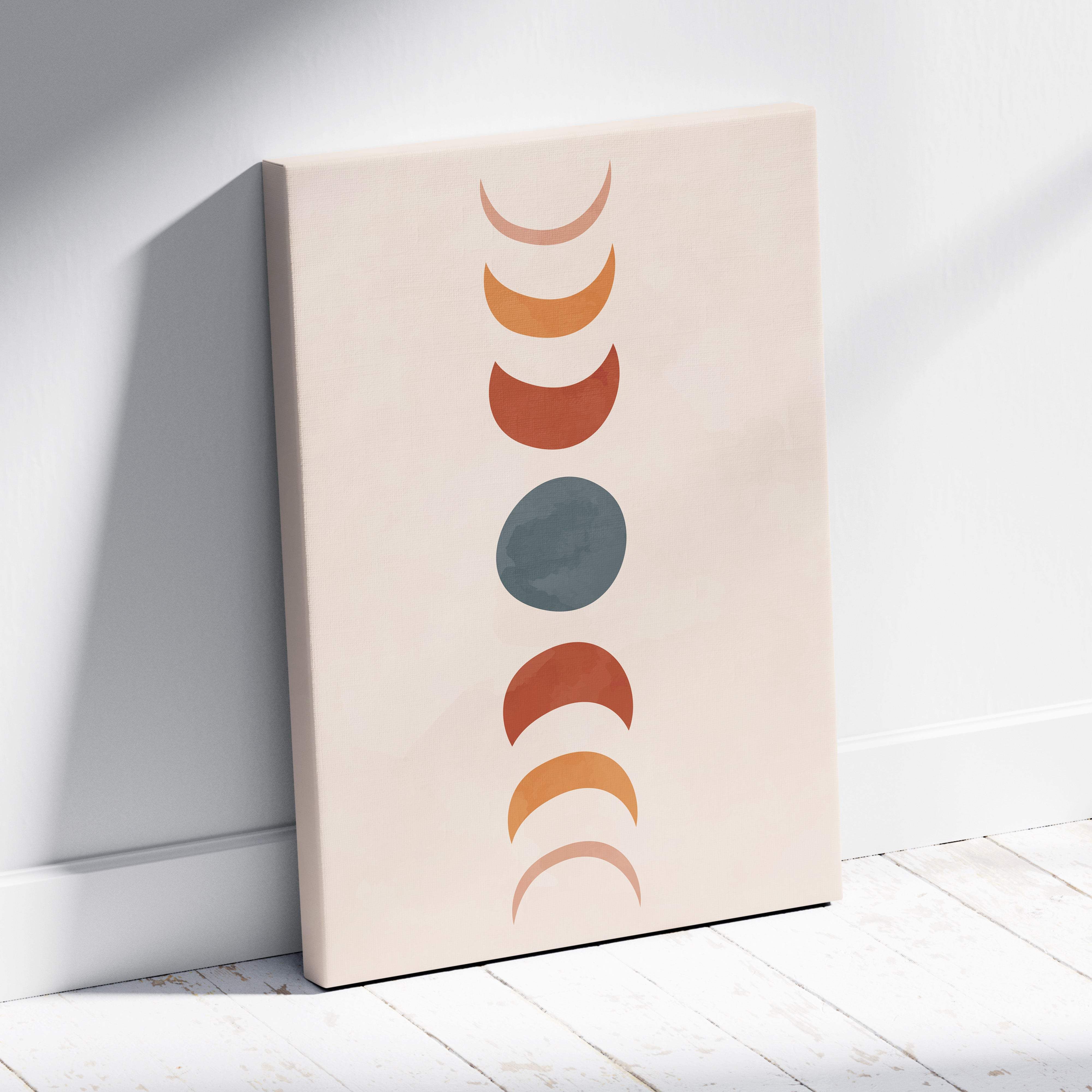 Beige canvas print featuring vertical stylized moon phases in terracotta rust and sage green for modern boho decor