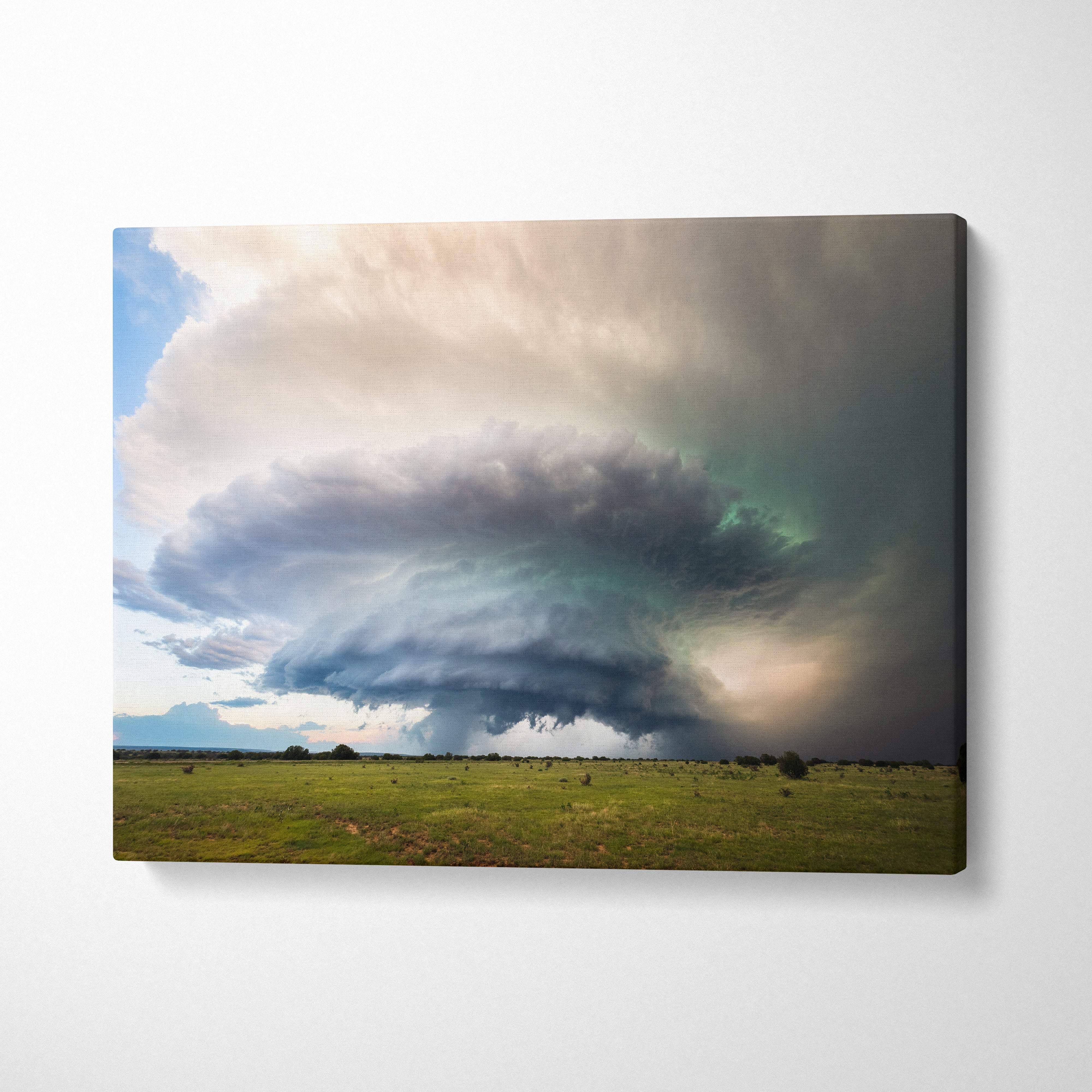 Canvas print of a supercell storm cloud with moody green sky over a dramatic thunderstorm on a cinematic plains landscape