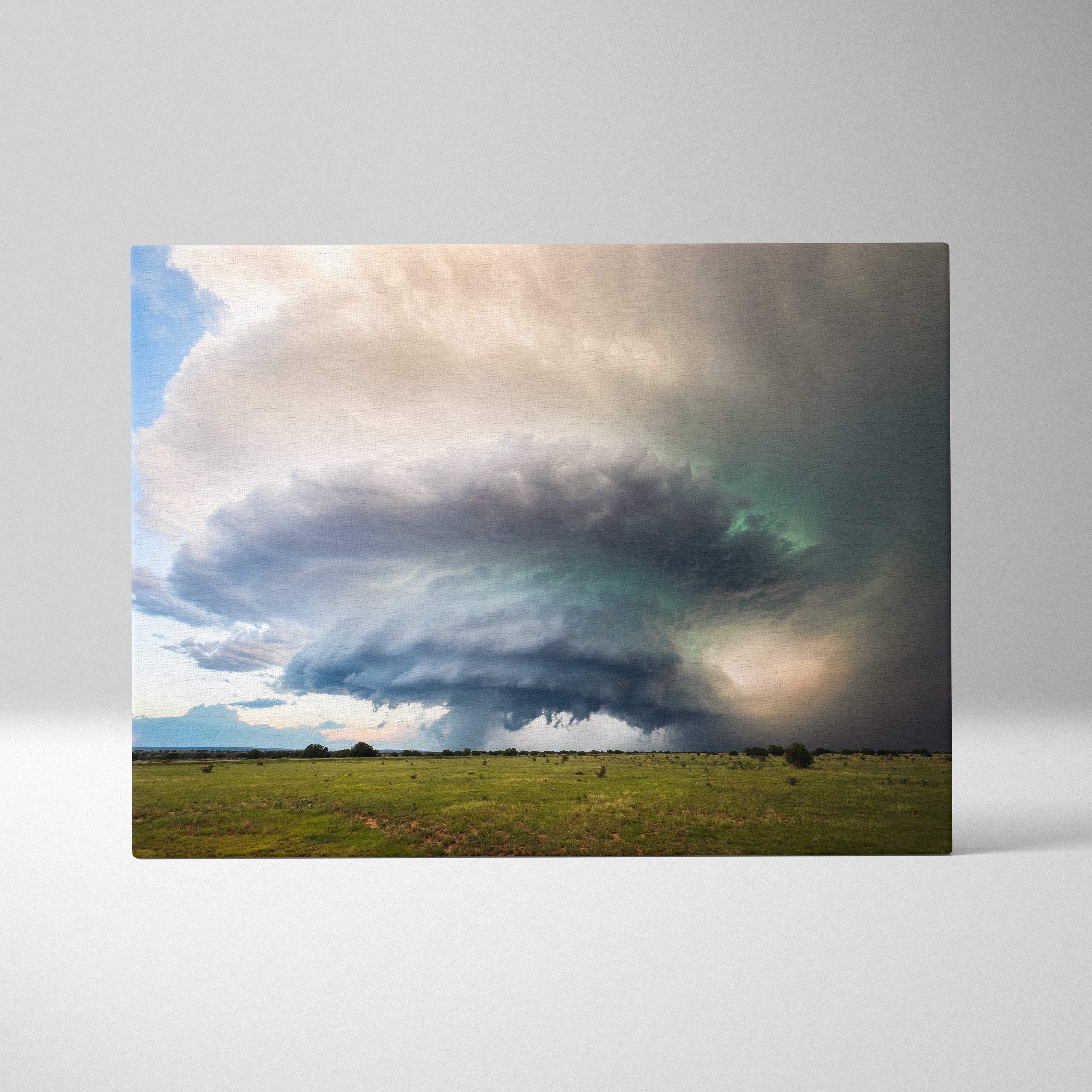 A rectangular canvas print featuring a dramatic green supercell storm cloud over an open field for wall decor