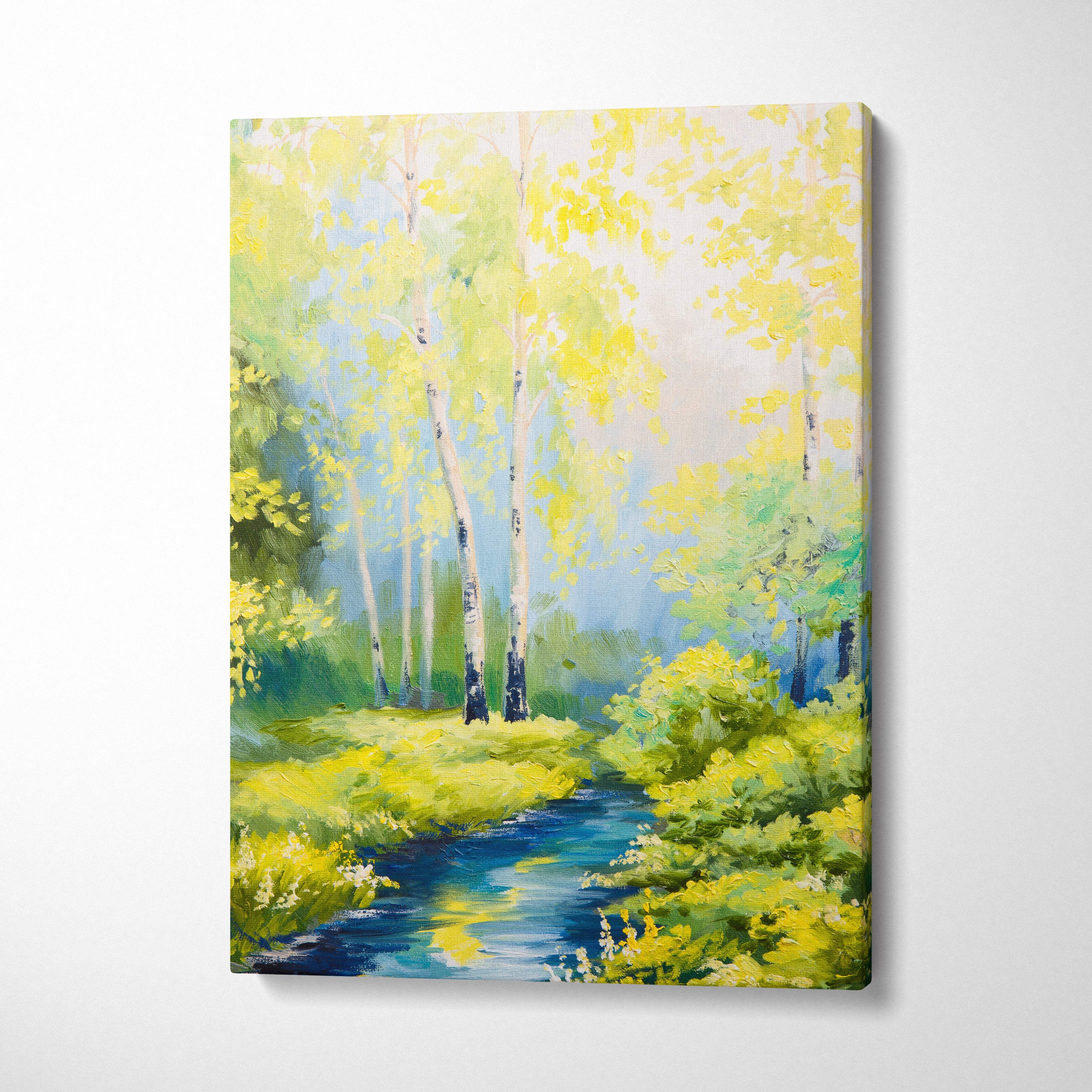 A vibrant yellow green birch forest canvas wall art painting with a bright blue stream for living room decor