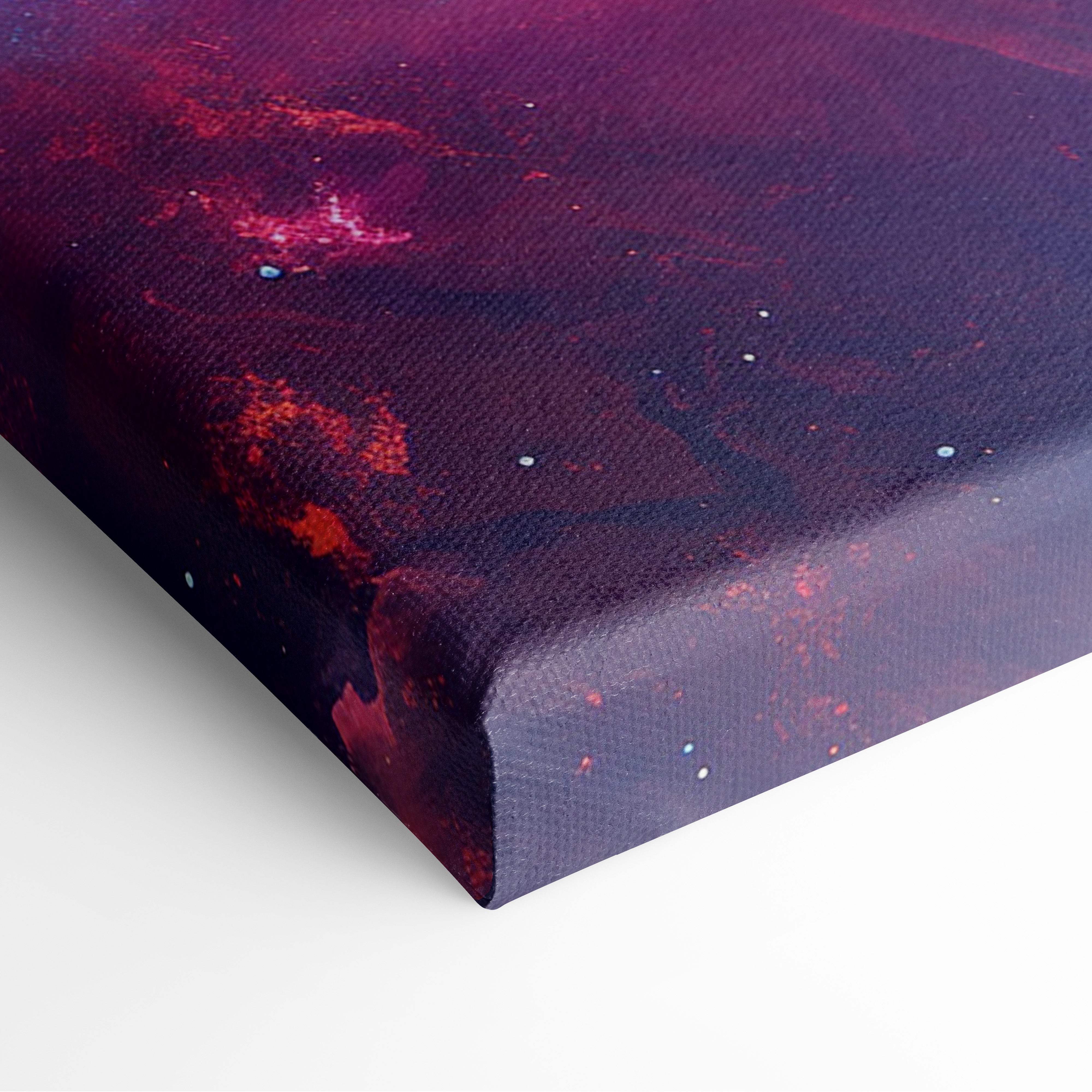Cosmic nebula canvas wall art print featuring a deep purple and red galaxy spiral on textured canvas for dreamy rooms