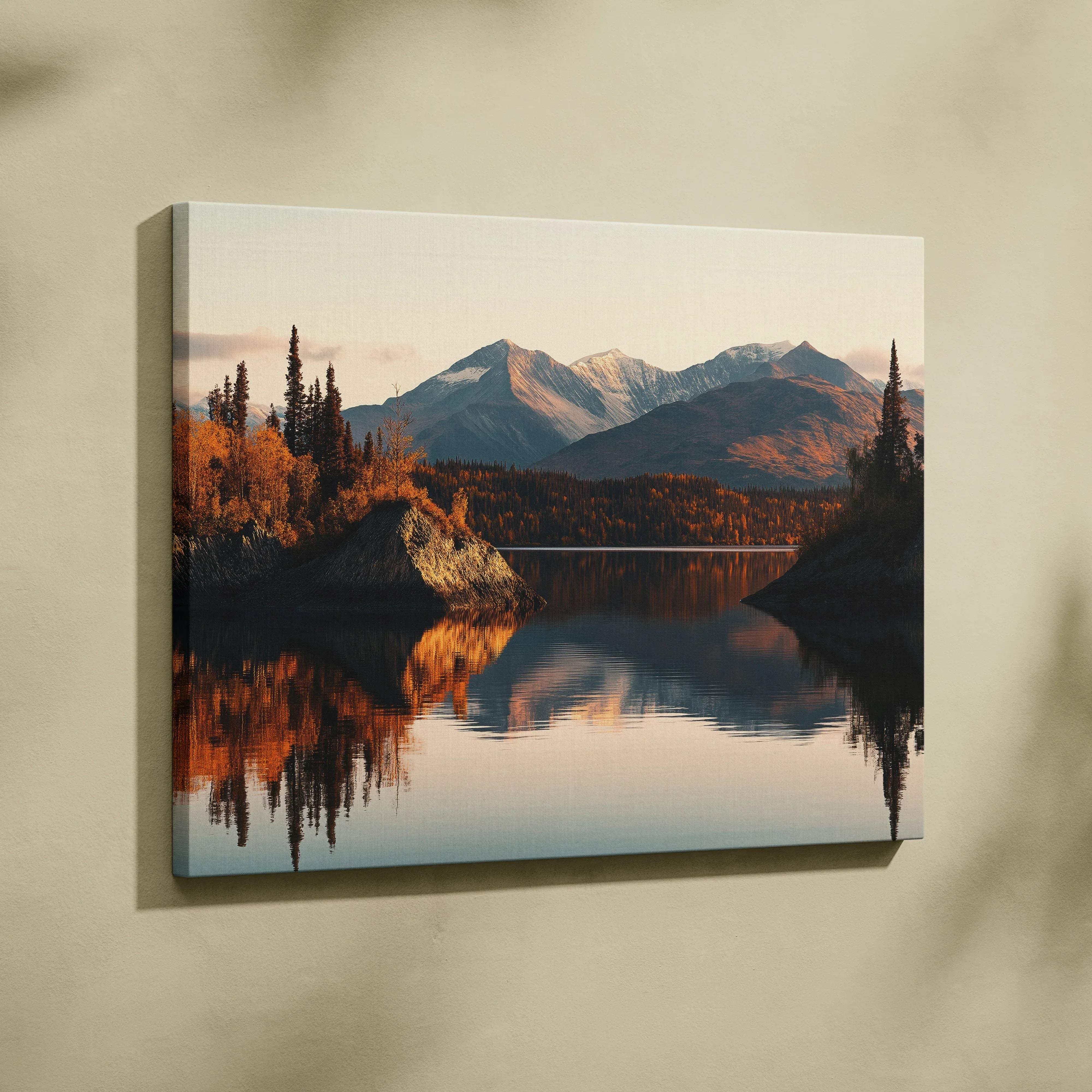 A rectangular canvas print of autumn mountains landscape featuring golden foliage and snow-capped peaks reflected in a lake
