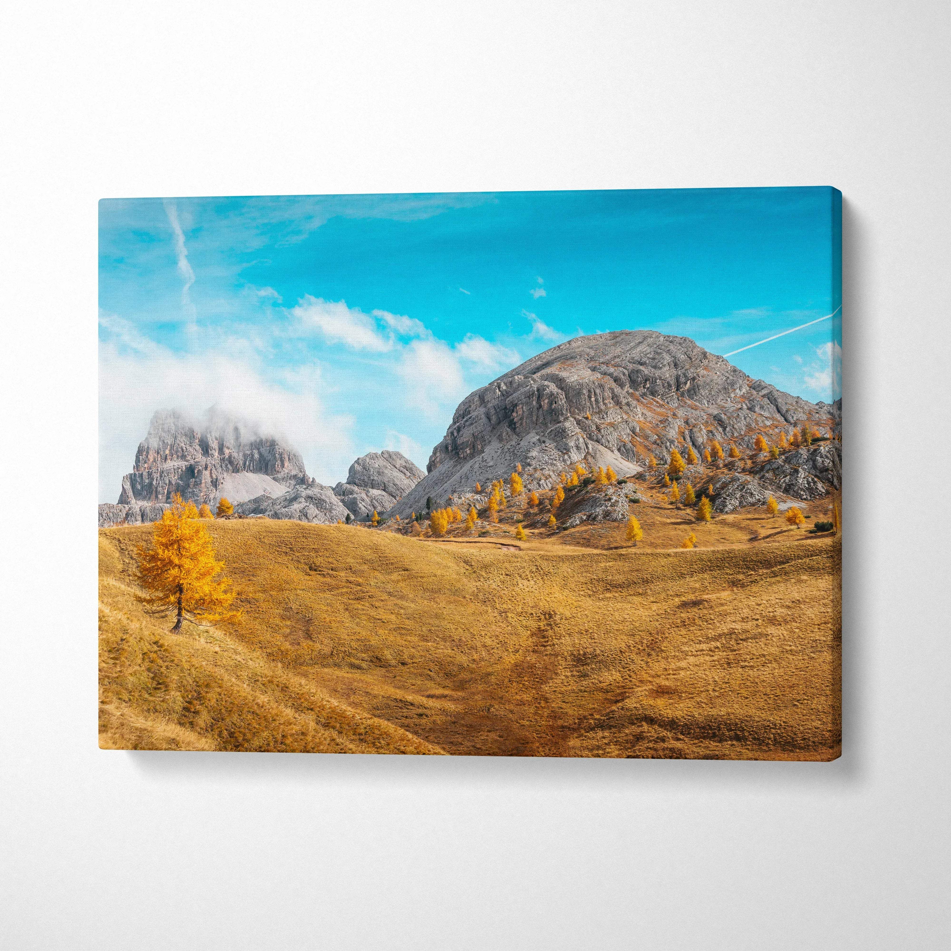Autumn landscape canvas art with golden leaves and rocky mountain under blue sky wall art.