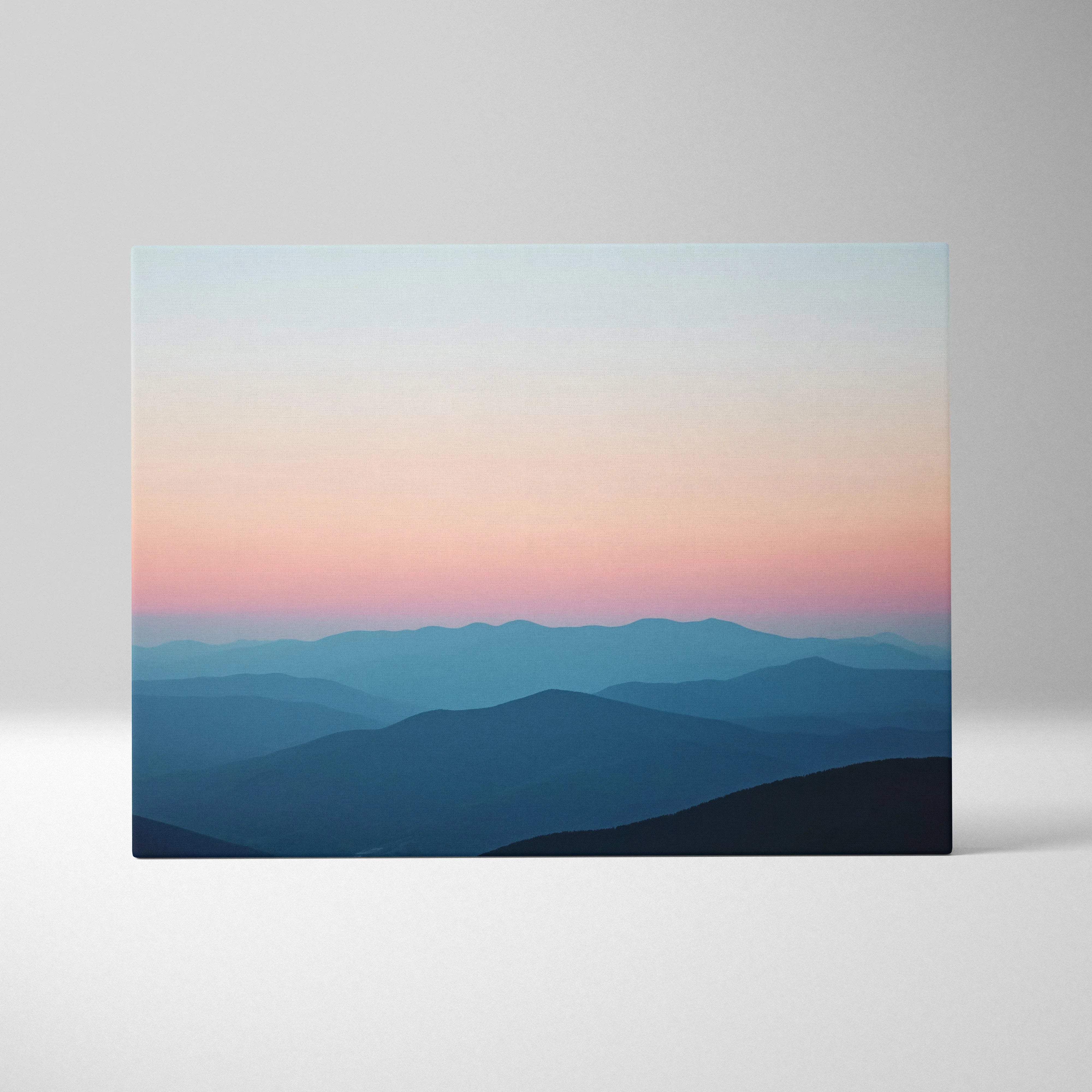 Canvas print of serene mountain landscape at dusk with pink blue gradient sky