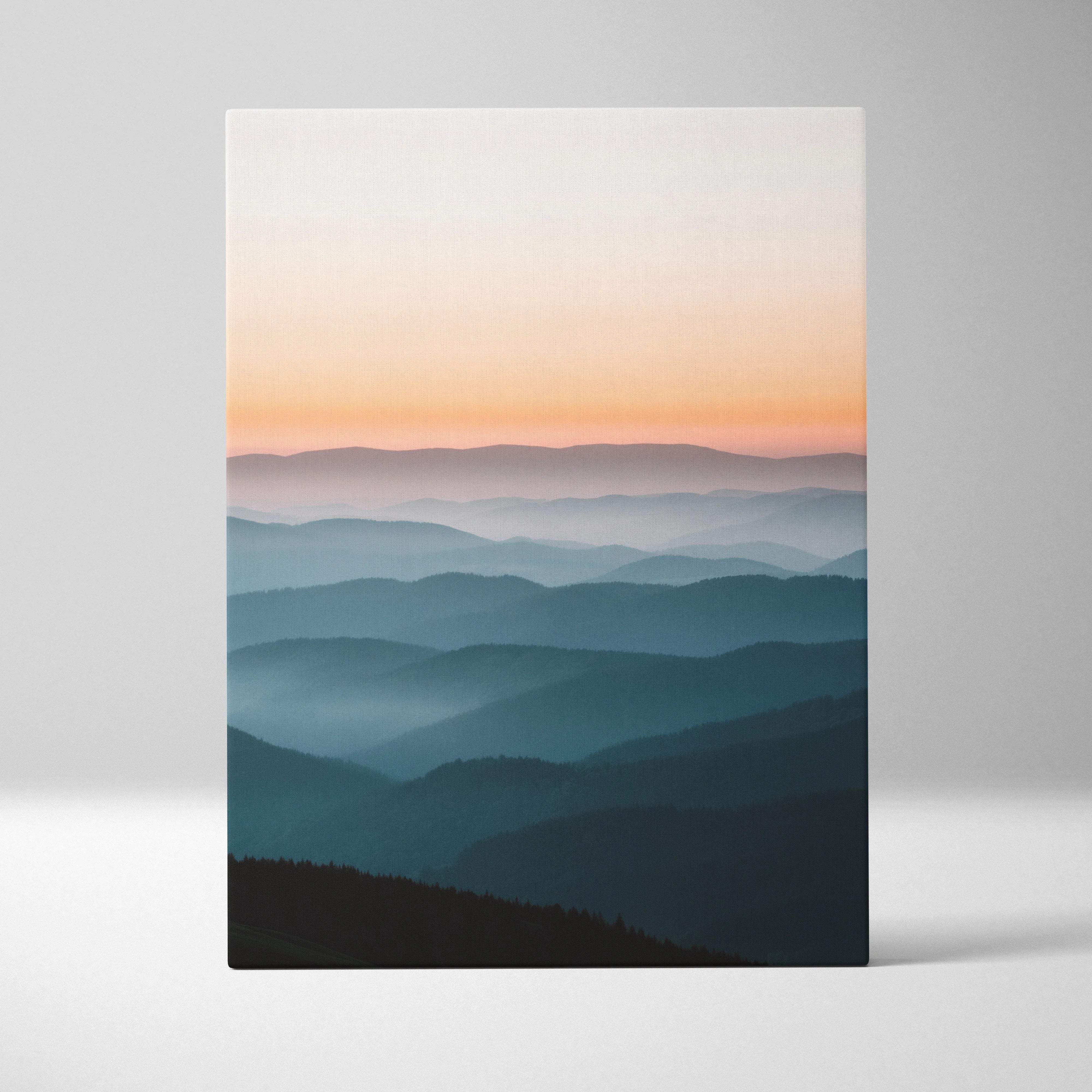 Canvas wall art of serene mountain ridge at sunset in calm peach blues