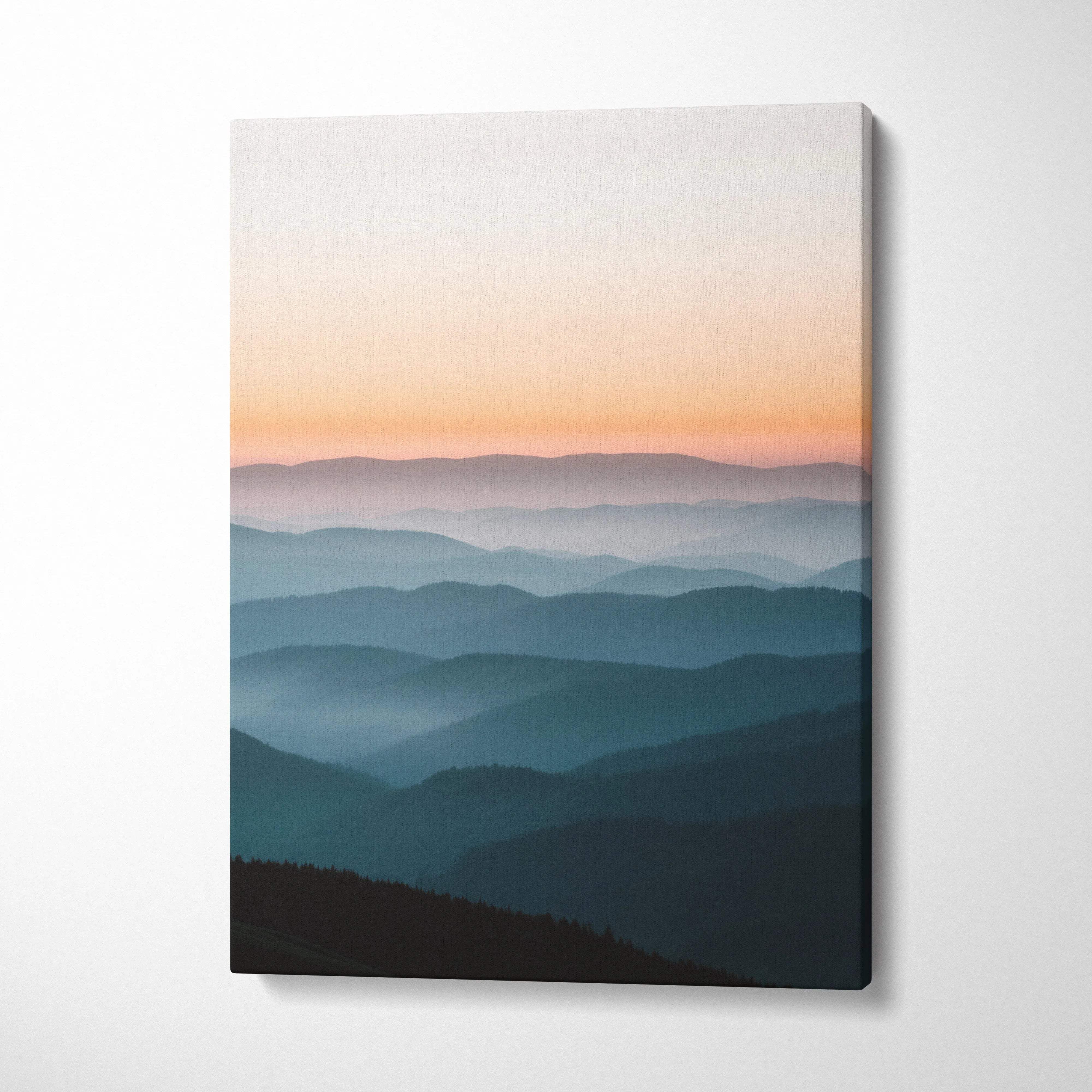Canvas wall art of serene mountain ridge at sunset in calm peach blues