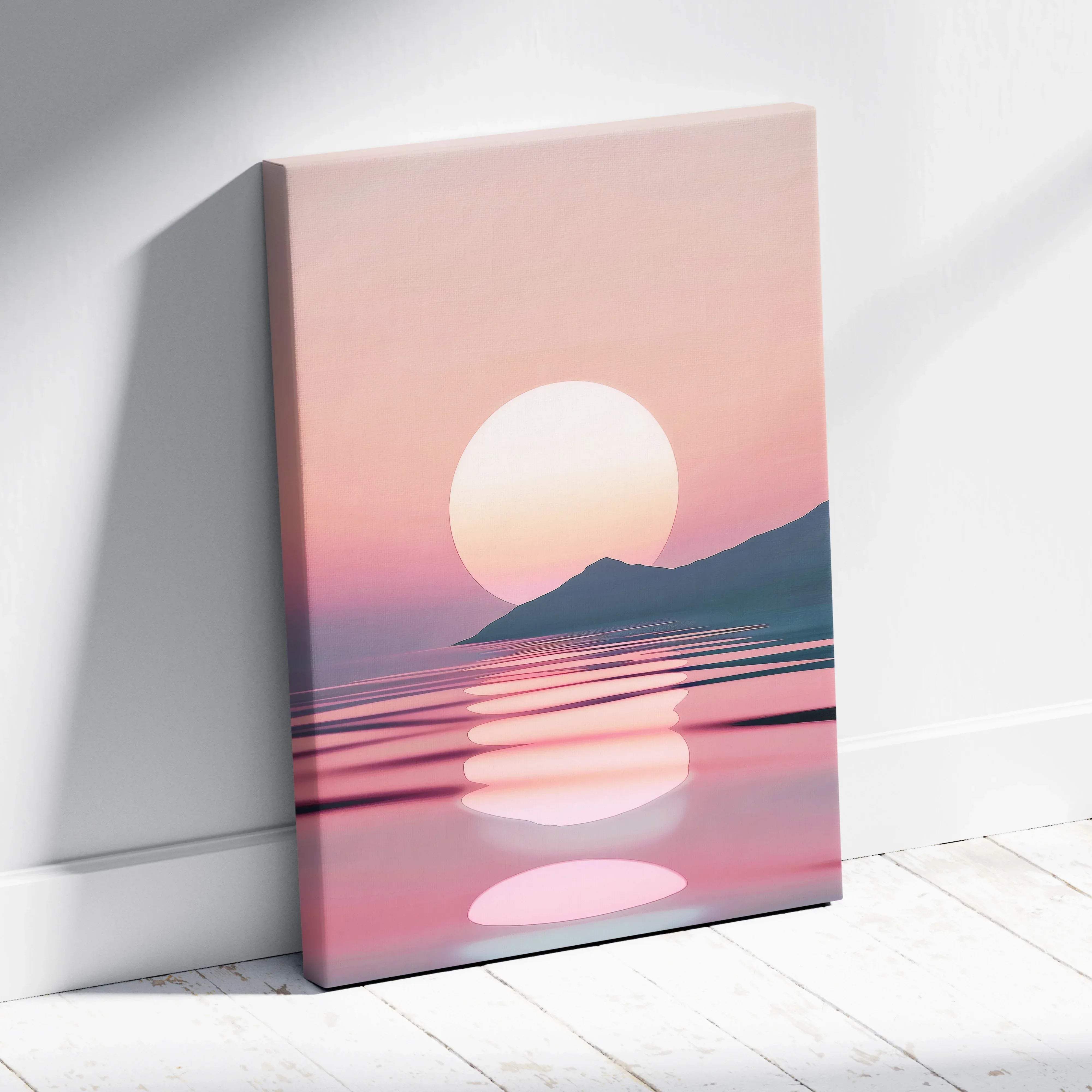 Minimalist sunset over the sea canvas print with soft pink and peach hues featuring glowing sun and silhouetted mountains