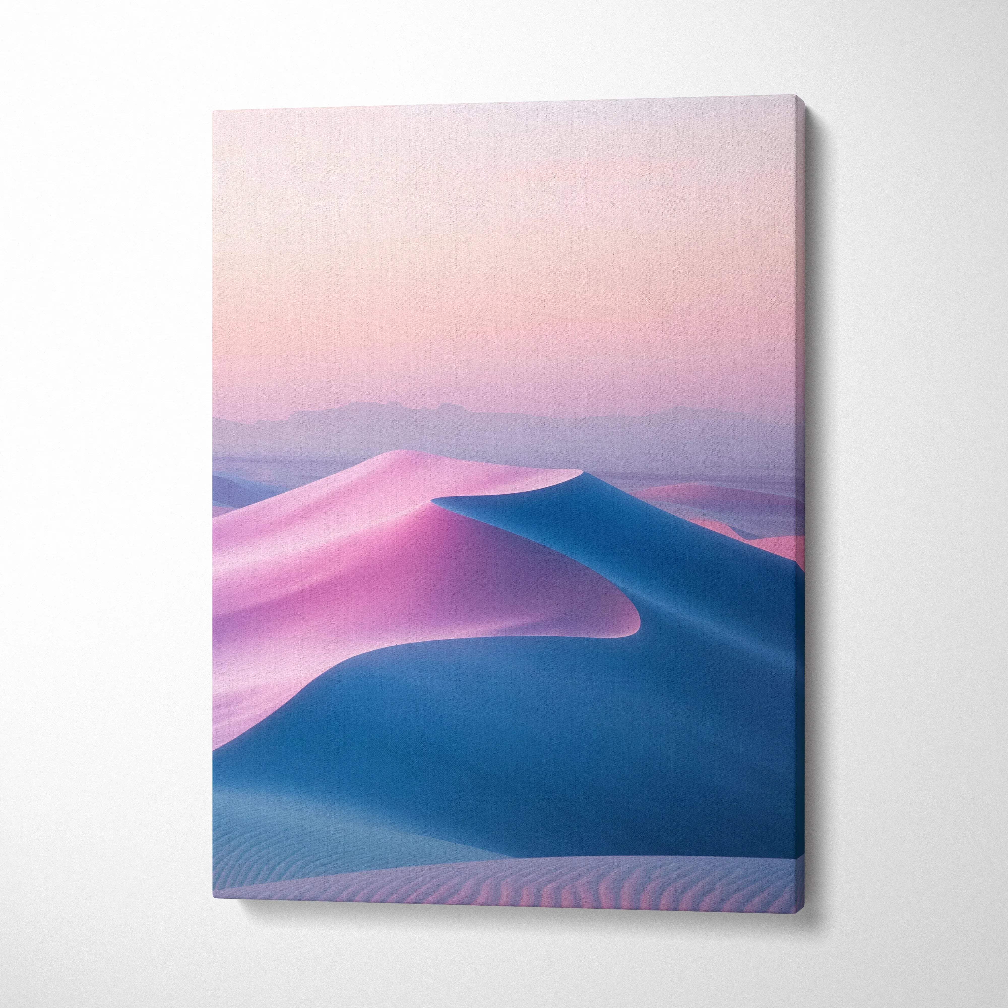 A minimalist rectangular canvas print of surreal pink and blue sand dunes under a pastel sky for modern interiors