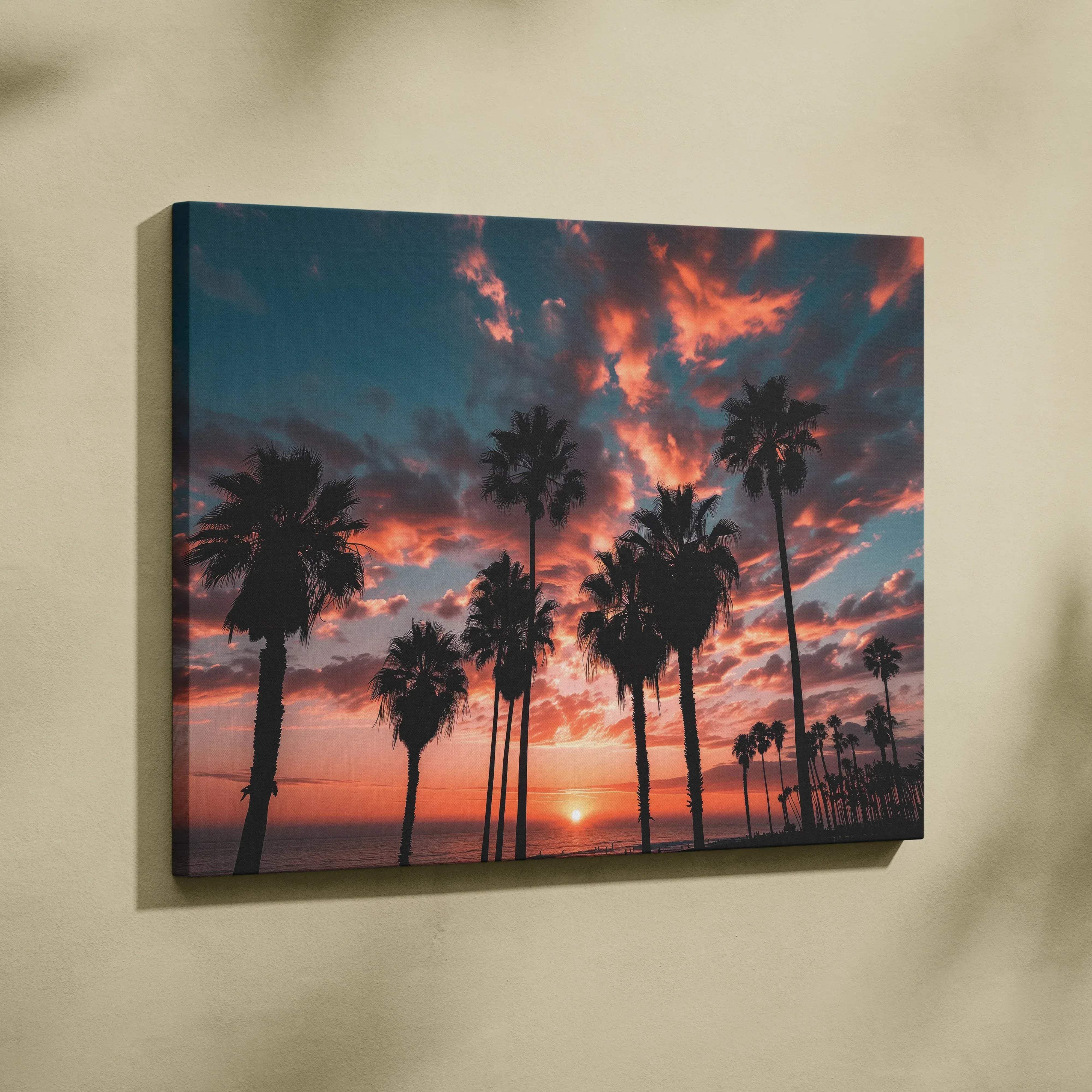 Canvas print of silhouetted palm trees at California coast sunset