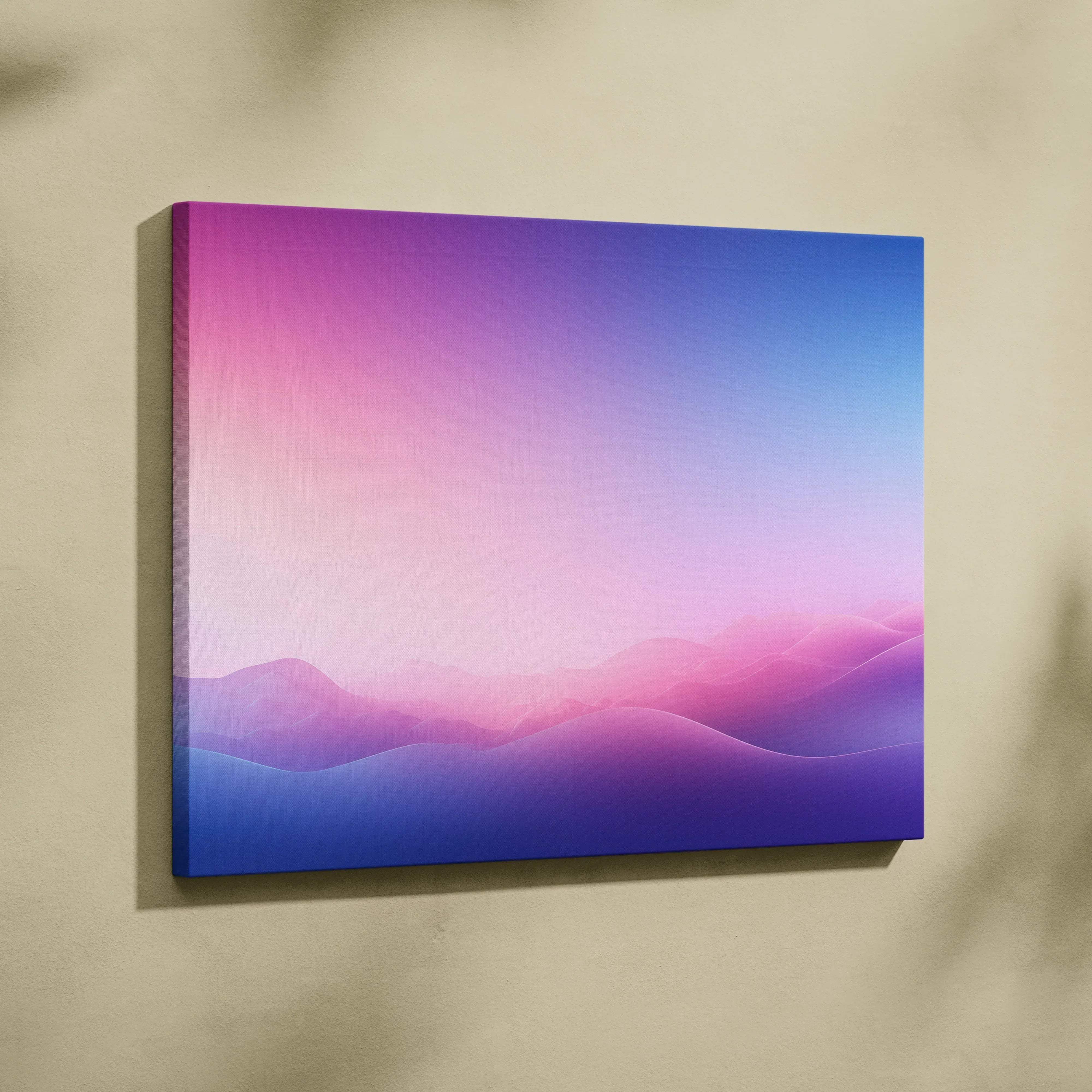 A rectangular canvas print with a soft purple pink blue gradient showing abstract mountain silhouettes for modern living room
