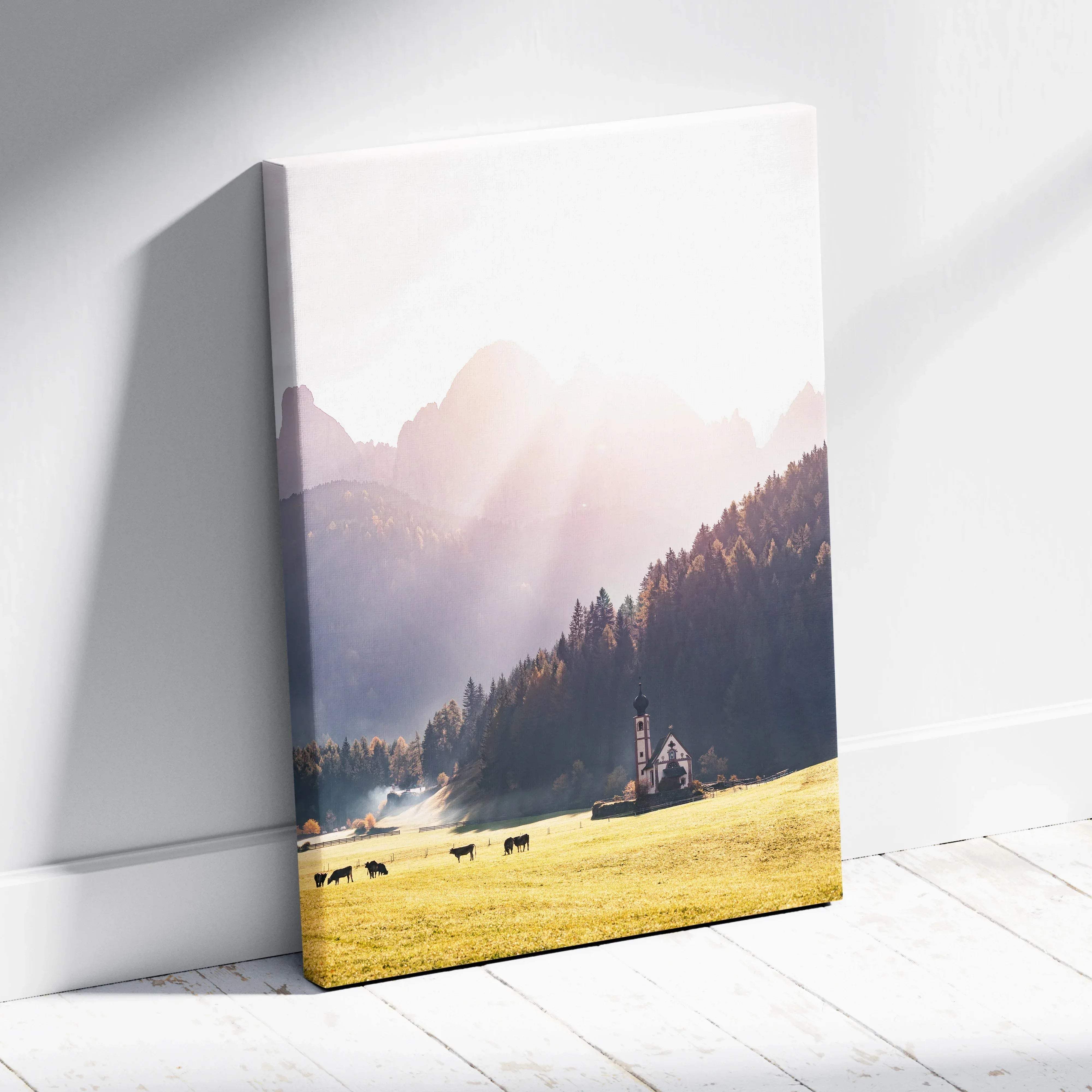 Rectangular canvas wall art featuring a pastel sunrise autumn mountain valley with a white church and grazing cattle