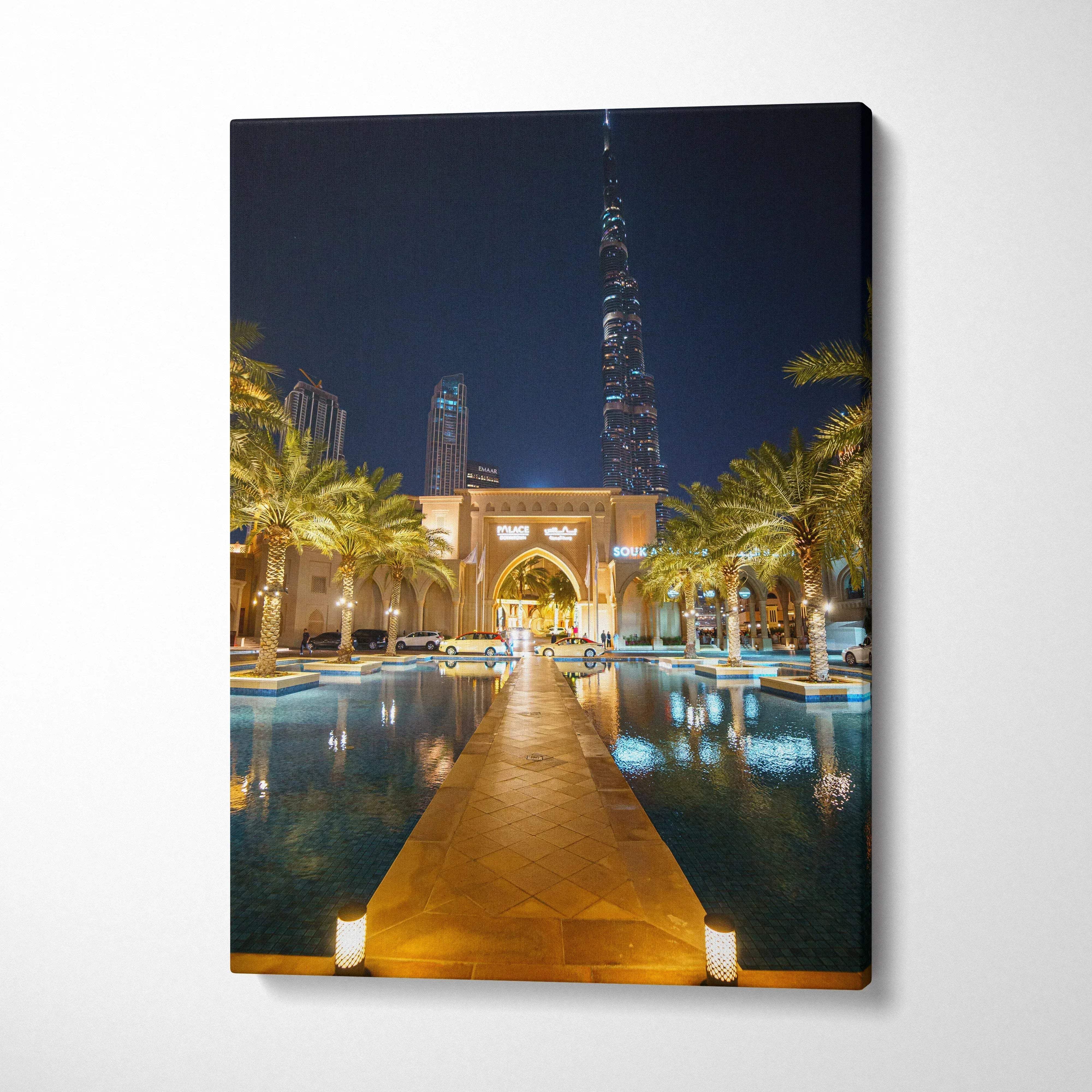 Canvas wall art featuring illuminated iconic architecture and urban nightscape with reflections.