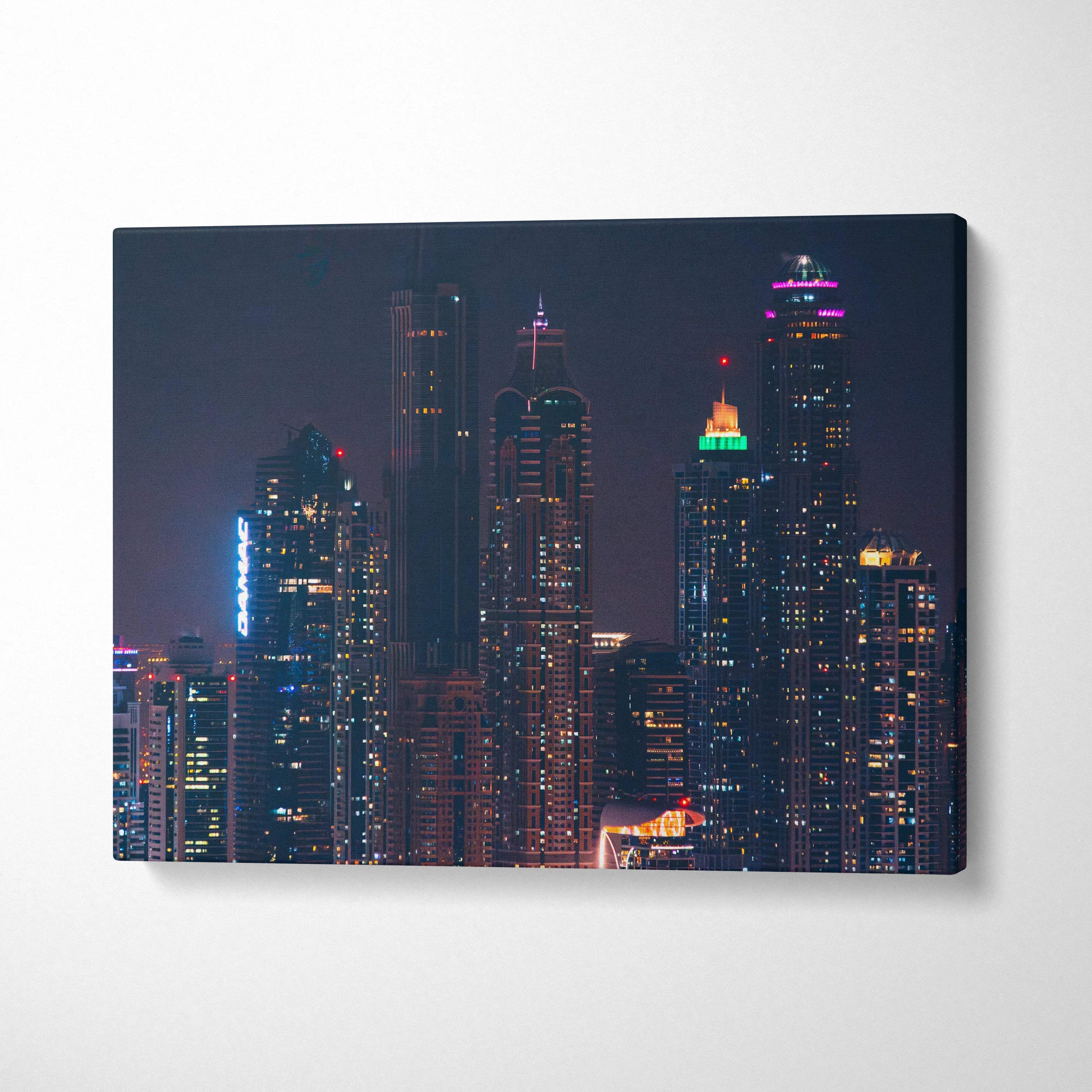 Nighttime city skyline canvas art with illuminated modern skyscrapers and dark sky backdrop.