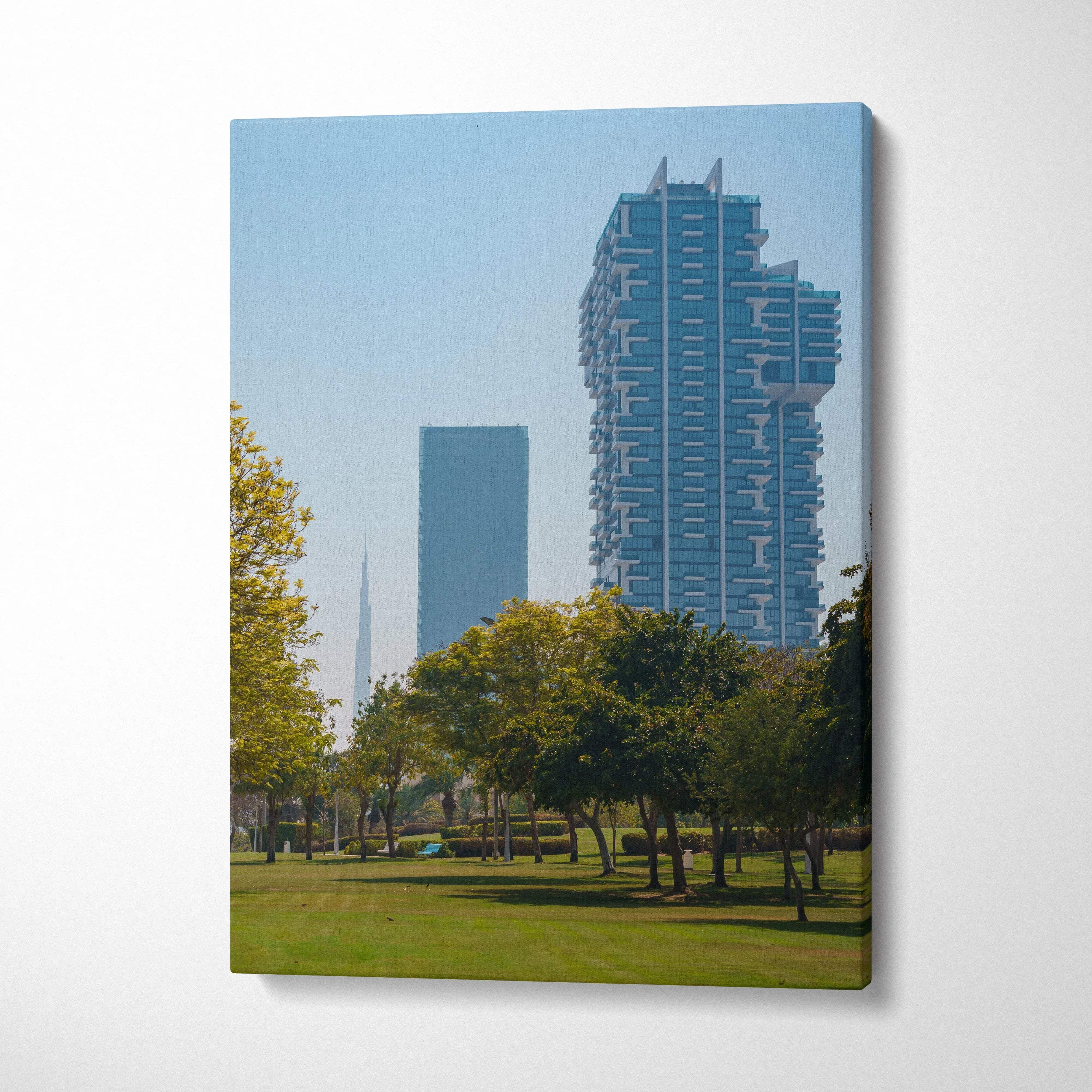 Canvas wall art featuring a clear blue sky with modern skyscrapers and green park trees.