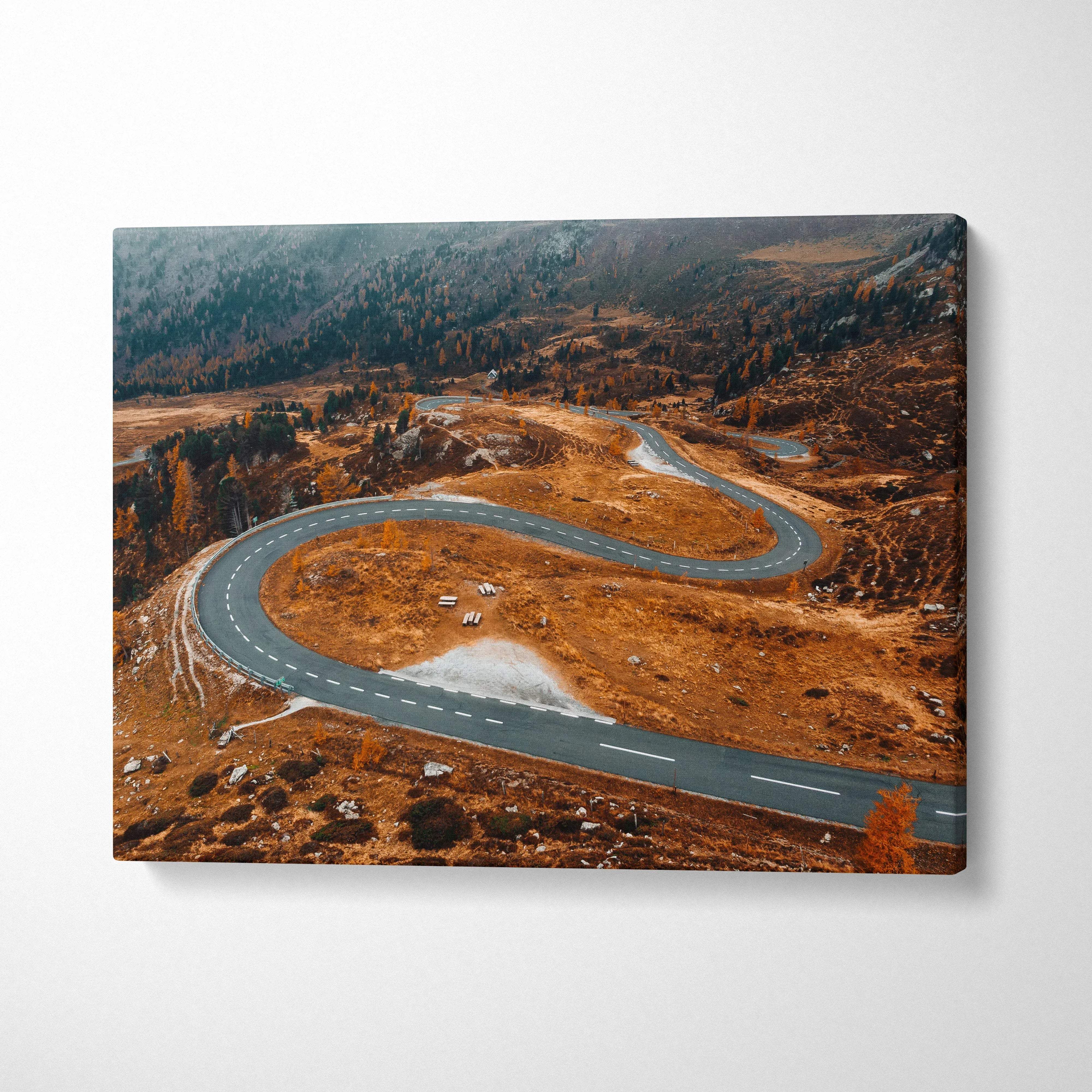 Autumn landscape canvas art with winding road and vibrant orange foliage wall art.