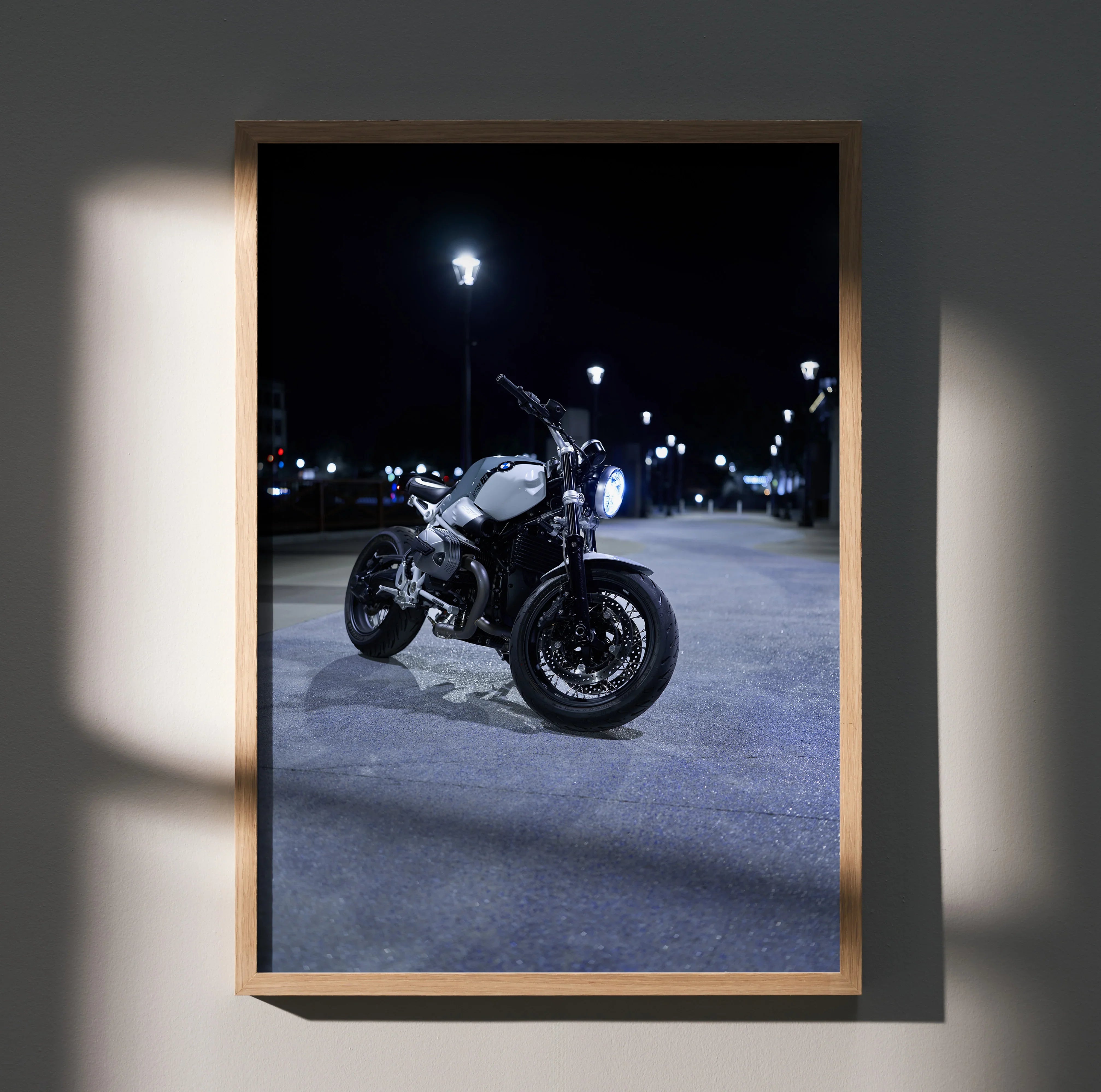 BMW R Nine T motorcycle poster wall art with dark urban night setting and spotlights.