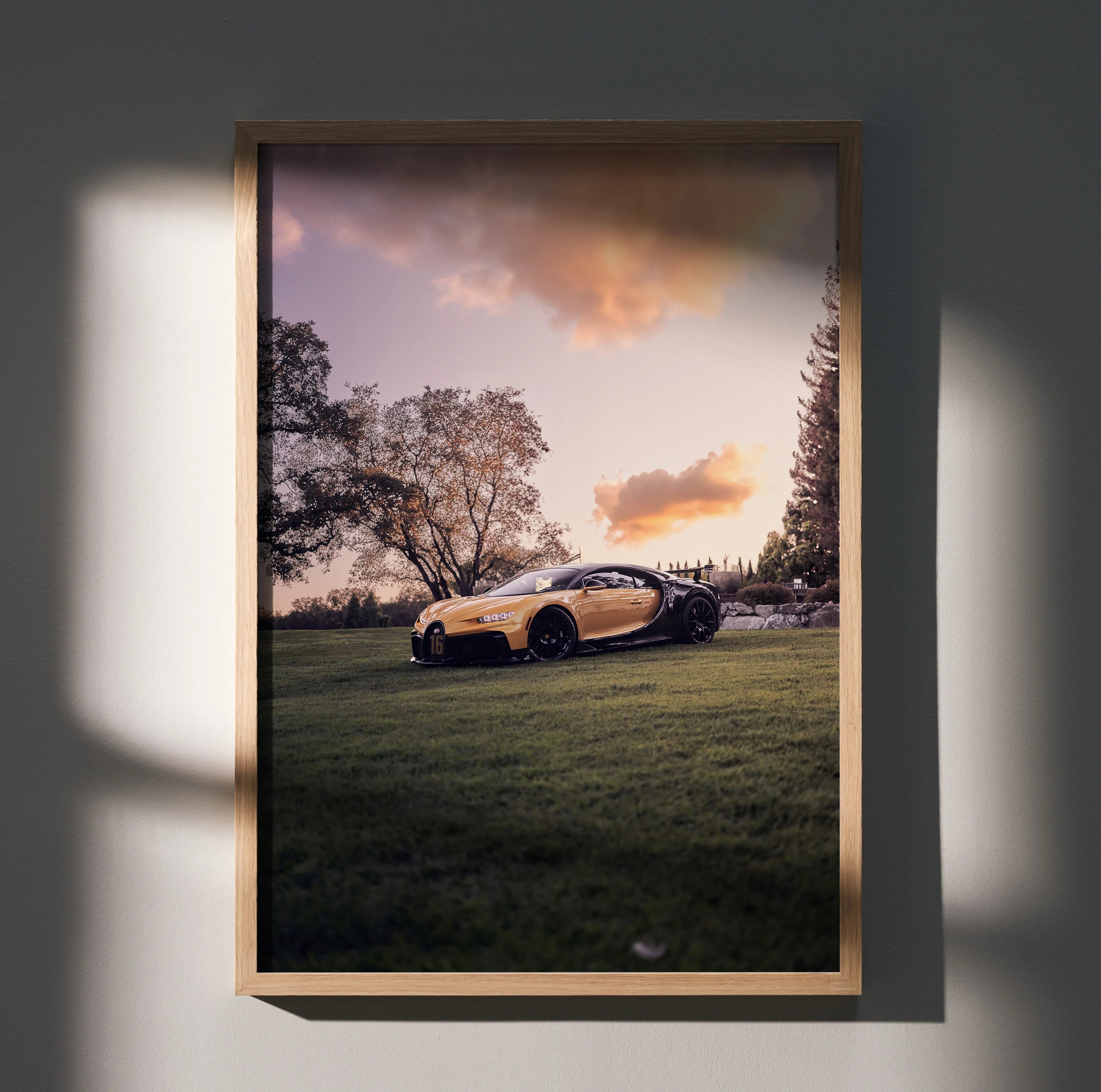 Bugatti Chiron Pur Sport hypercar poster at sunset with warm sky and grassy field wall art.