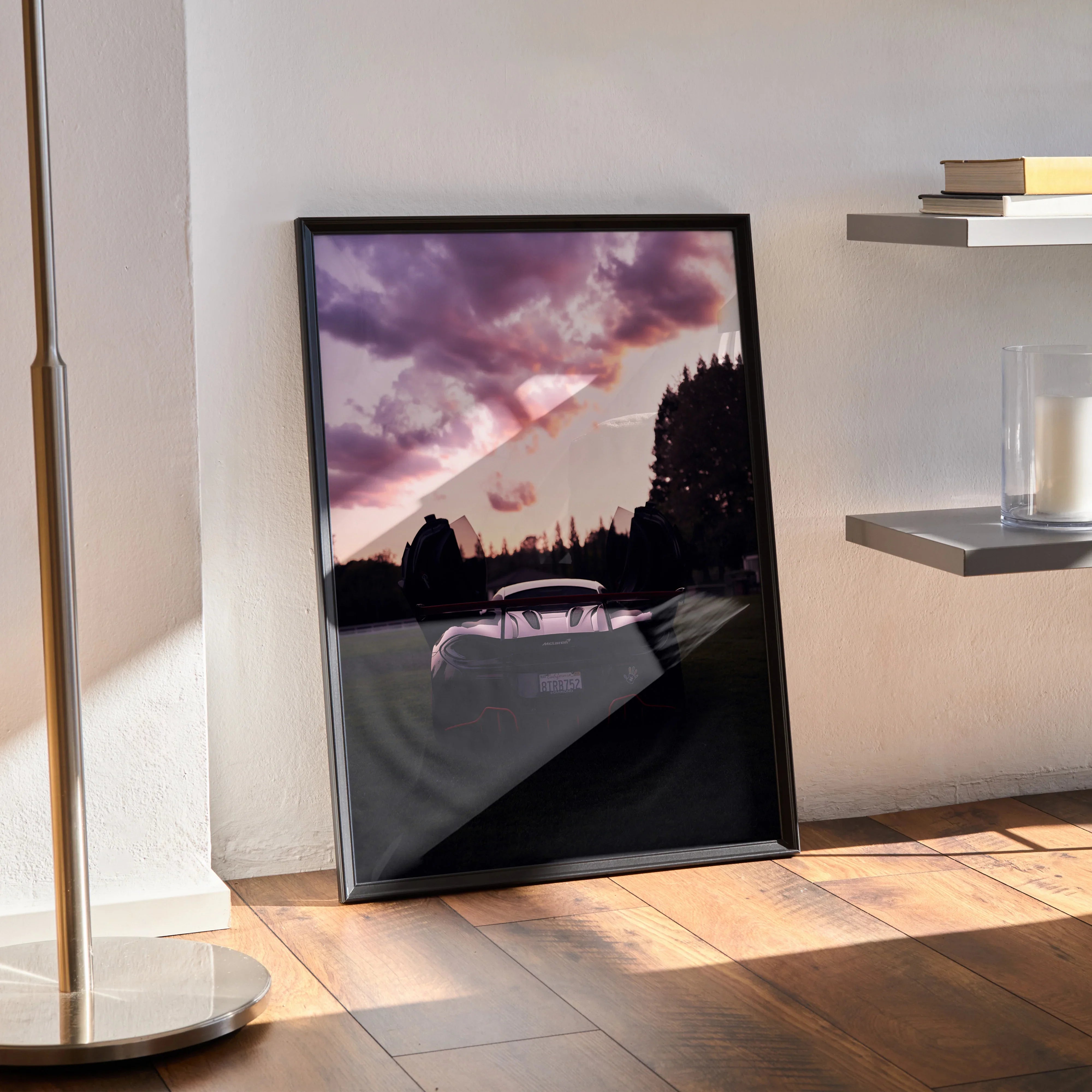 McLaren 570s luxury car poster with dramatic sunset sky in black frame, modern wall art for home decor.