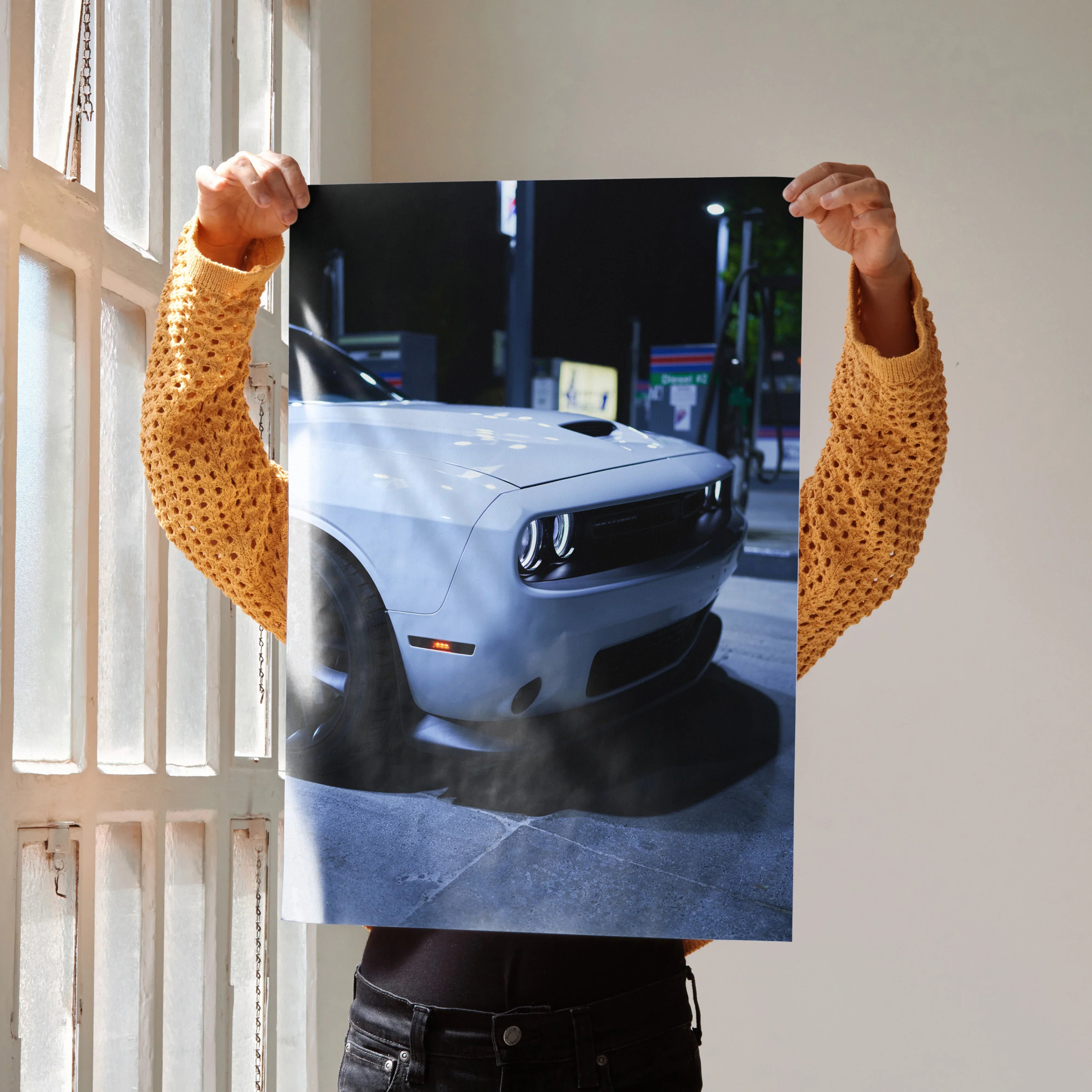 Dodge Challenger front view poster with glossy finish, premium wall art for automotive decor.