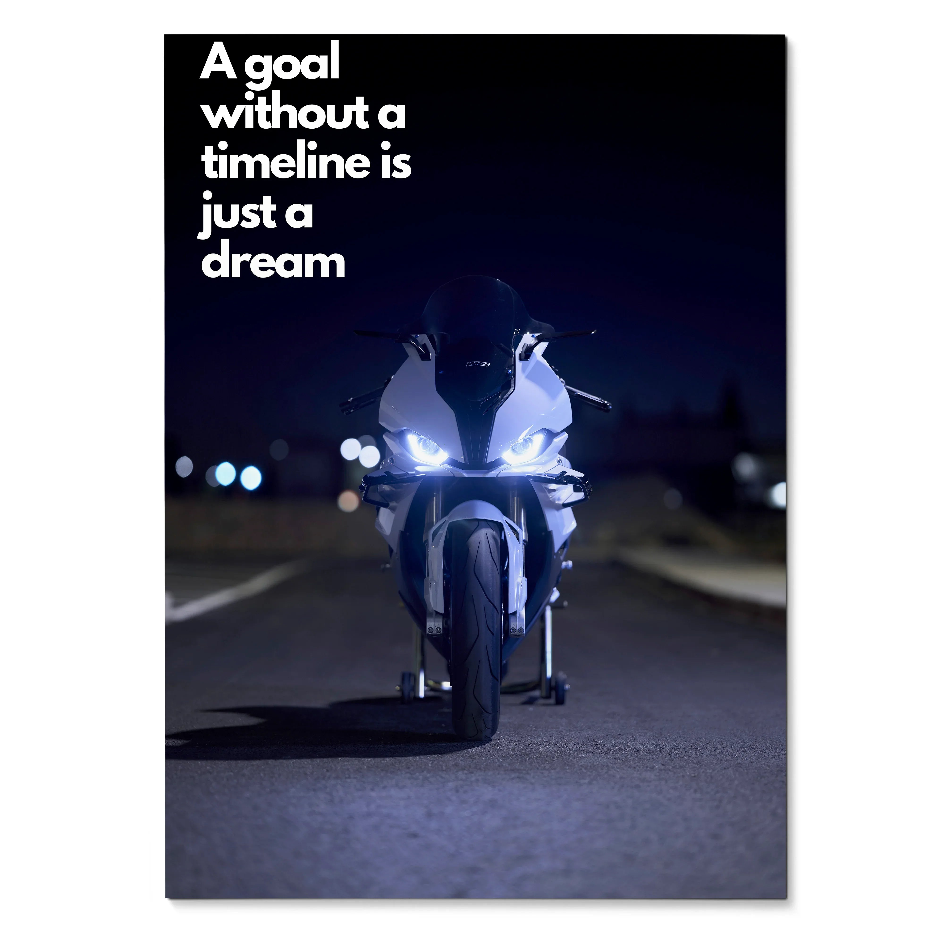 BMW S1000RR motorcycle at night with motivational quote poster wall art reading "A goal without a timeline is just a dream".