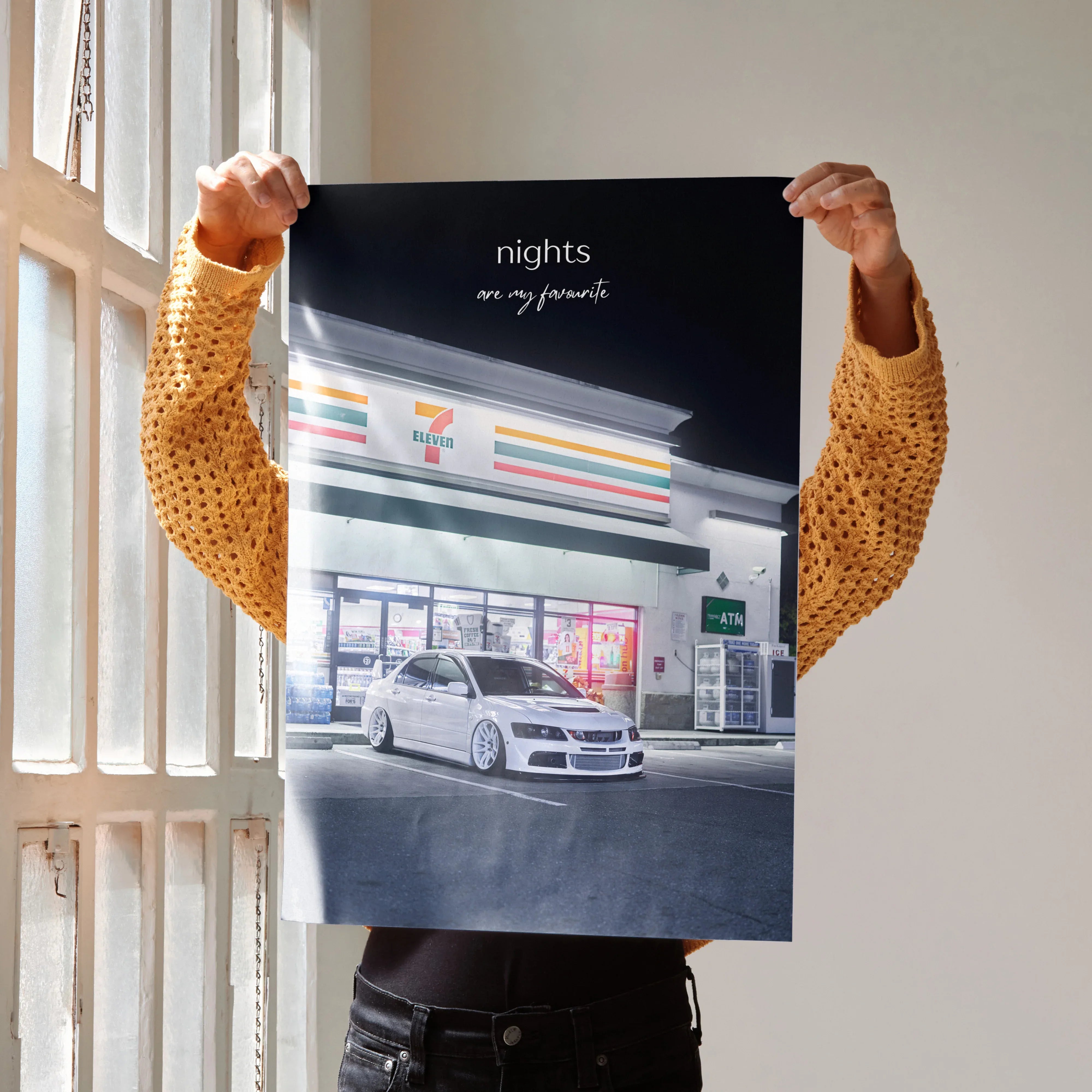 Motivational poster wall art featuring white Mitsubishi Evo 8 parked at gas station at night with inspiring text.