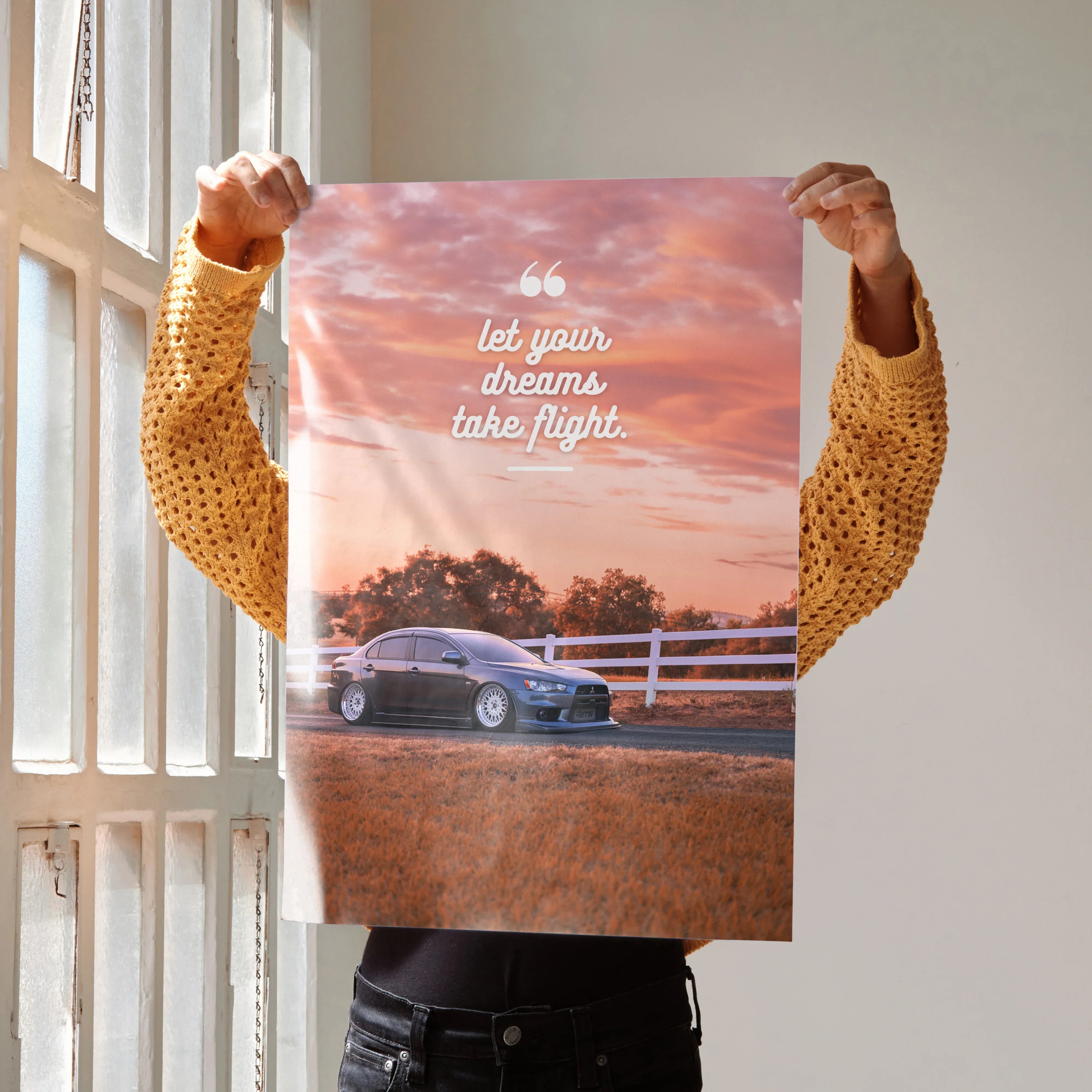 Motivational poster wall art featuring a Mitsubishi Evo 10 with inspiring sunset text.