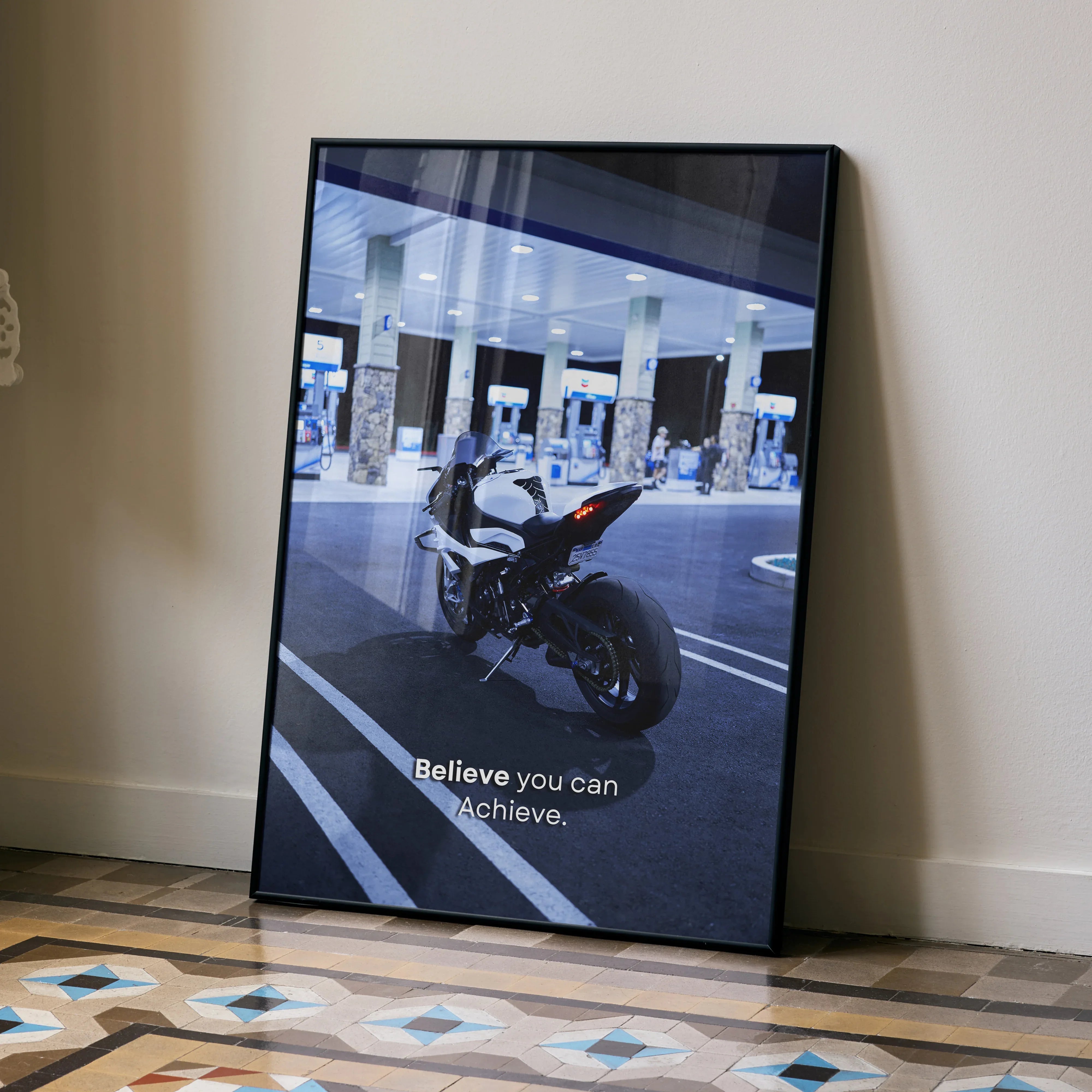 BMW S1000RR motorcycle with inspiring text motivational poster wall art in black frame.