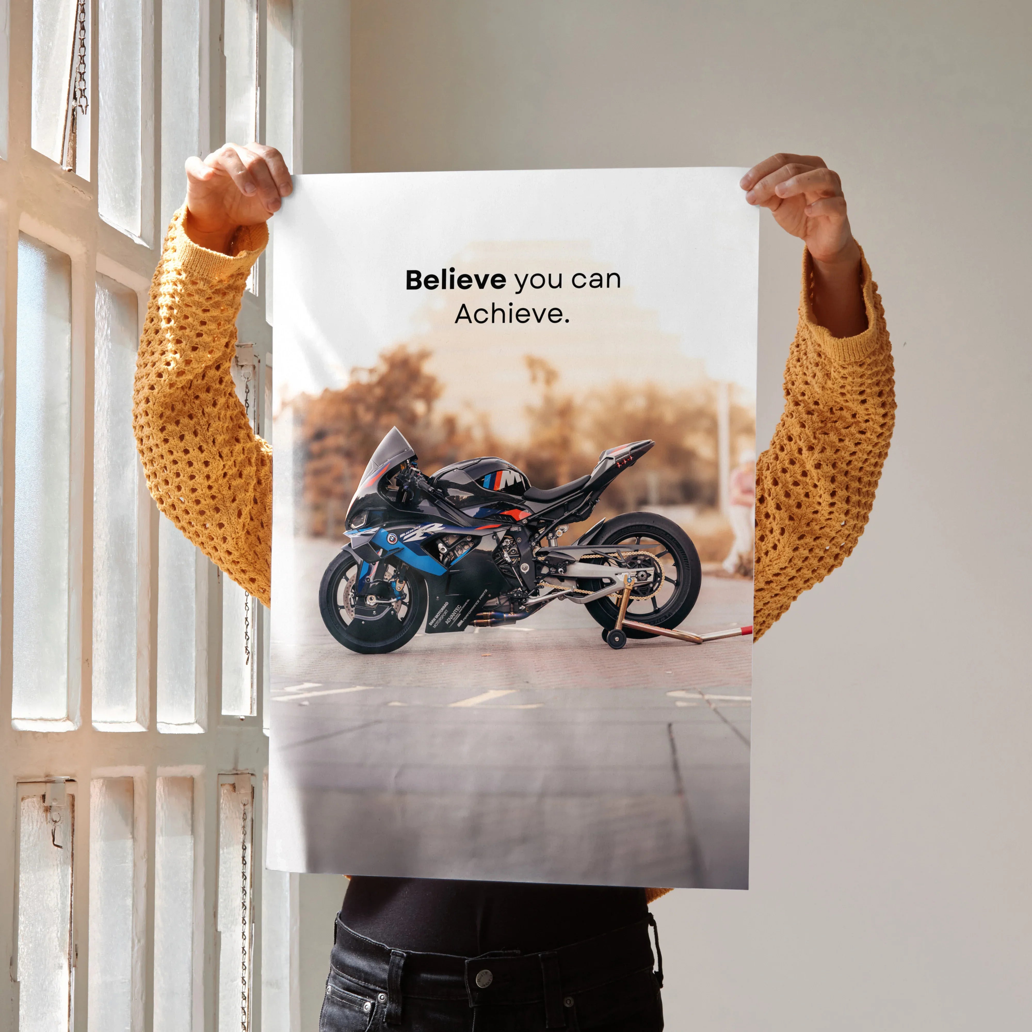 Motivational wall art poster featuring BMW M1000RR motorcycle with "Believe you can Achieve" text.