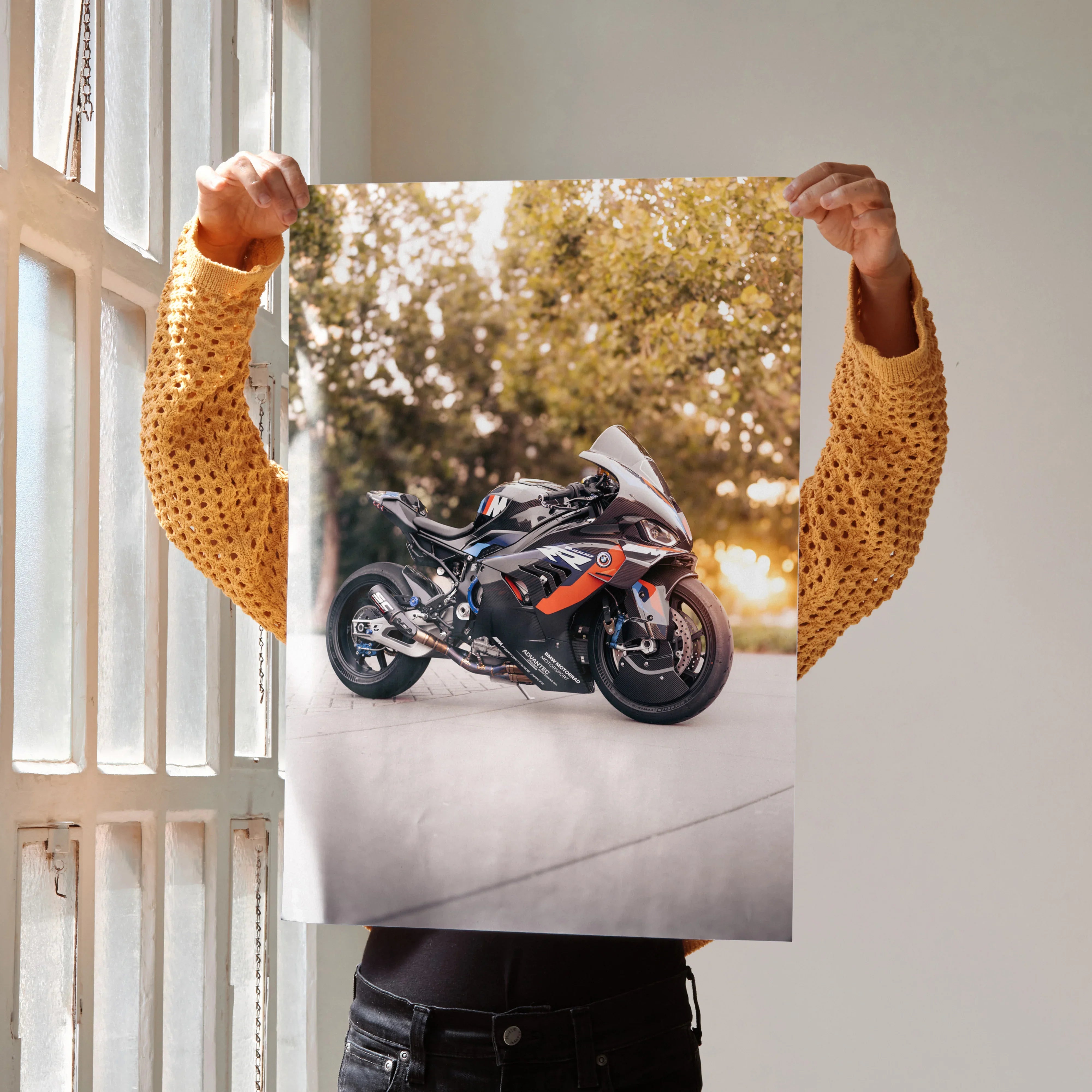 BMW M1000RR motorcycle poster with black and orange racing design, wall art for enthusiasts.