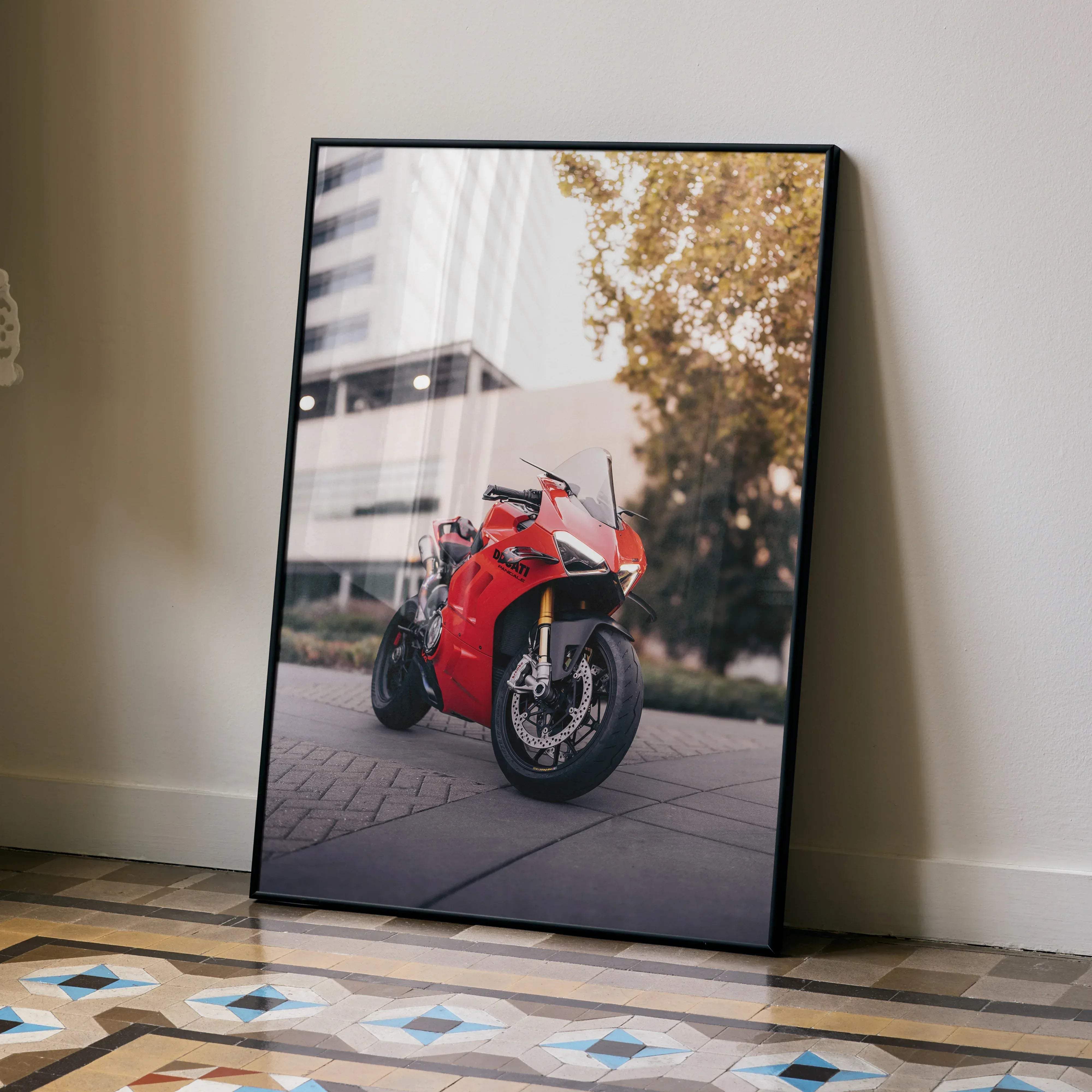 Red Ducati Panigale V4S motorcycle poster in black frame showcasing a sleek high-performance bike design