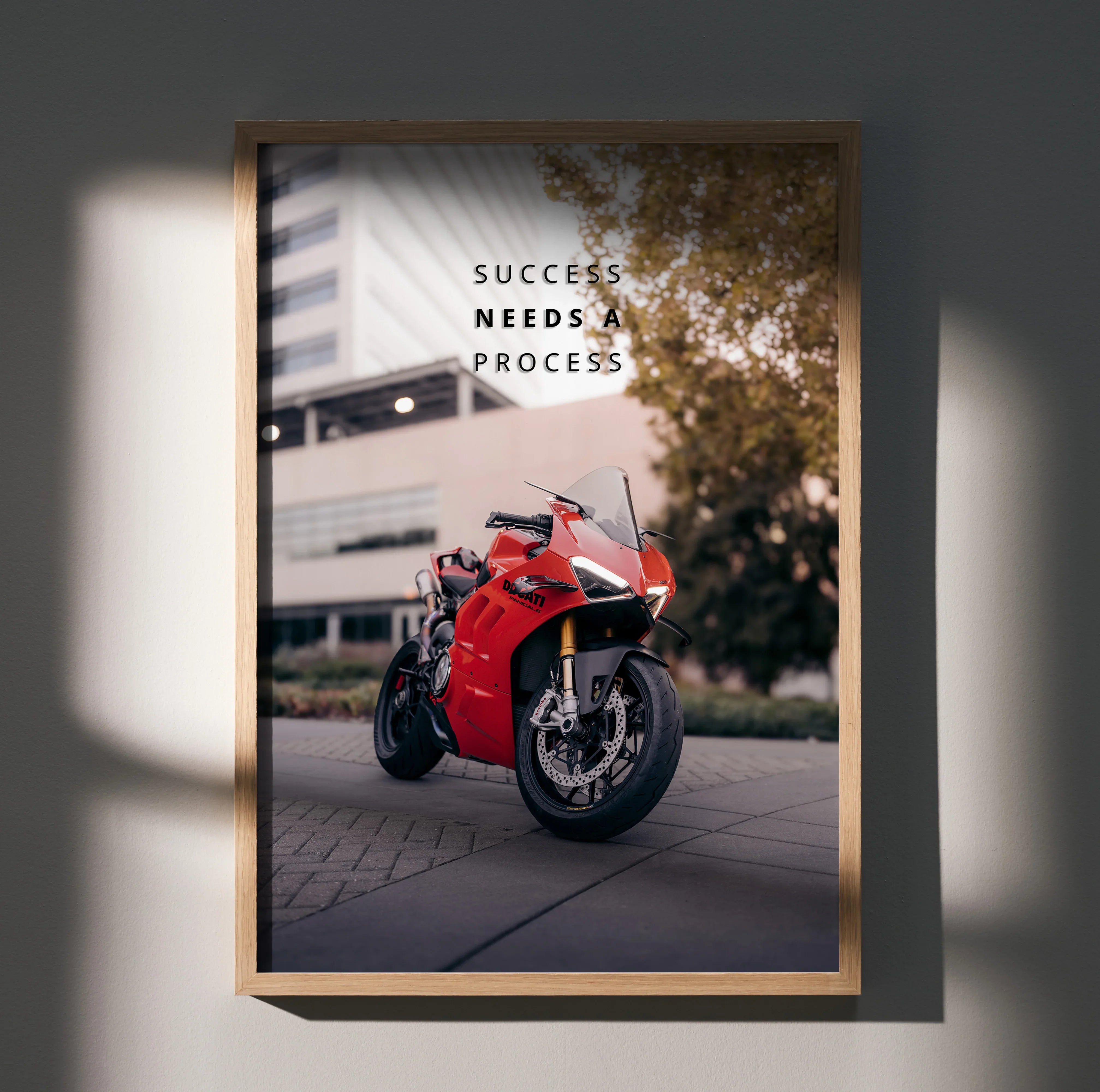 Motivational poster wall art featuring red Ducati Panigale V4S motorcycle with inspiring text success needs a process.