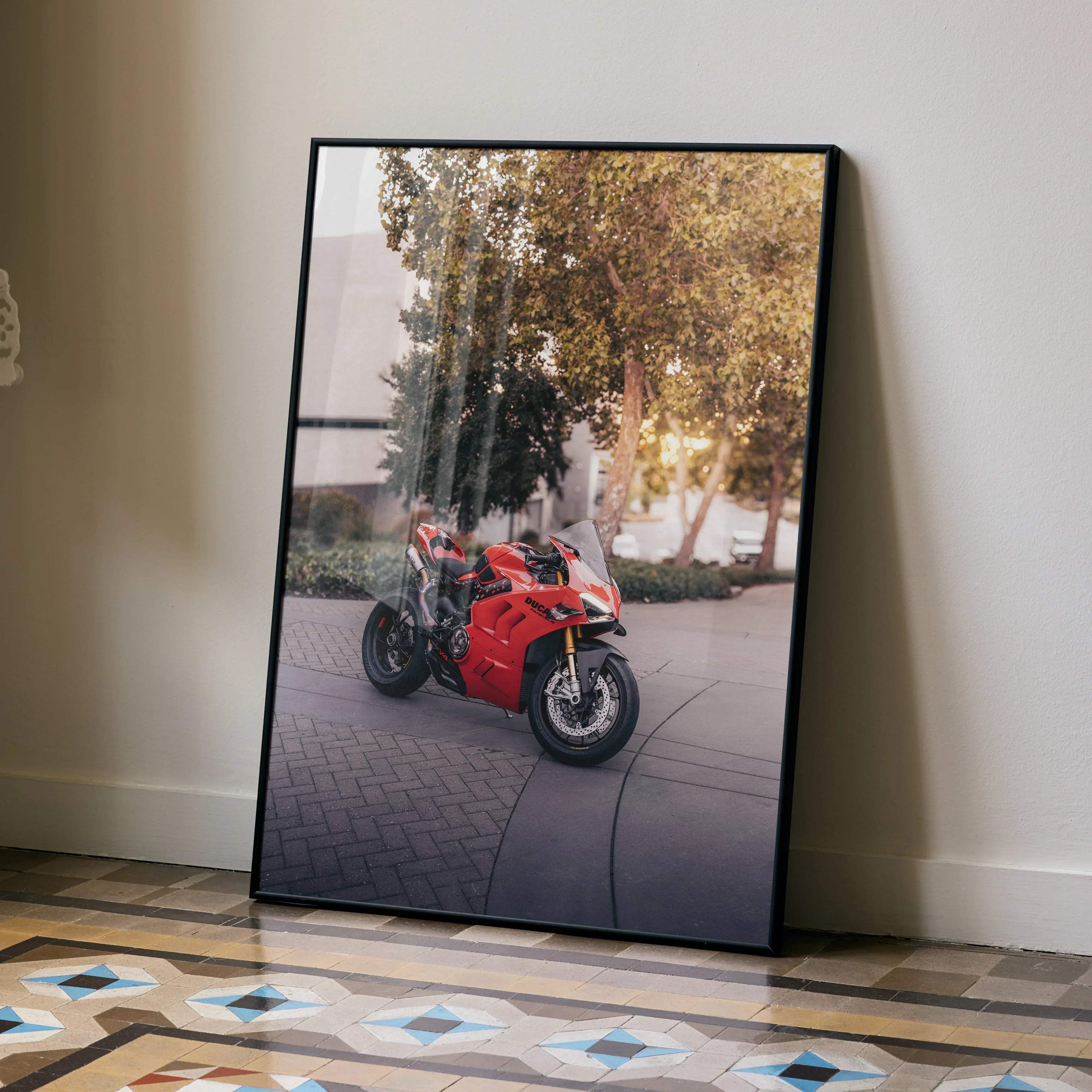 Red Ducati Panigale V4S motorcycle poster in a black frame featuring a detailed red sportbike illustration