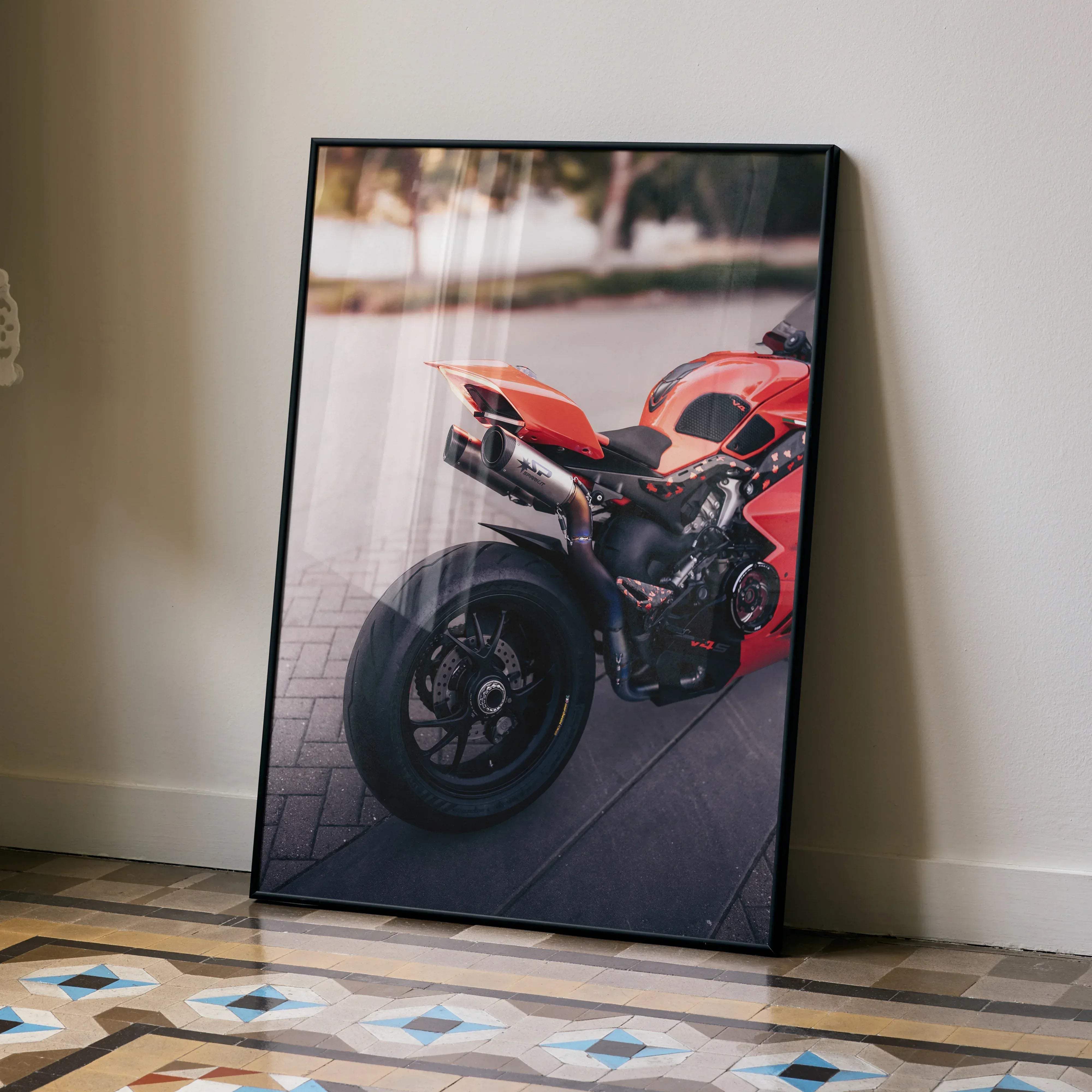 Red ducati panigale v4s motorcycle poster in a black frame showcasing the sport bike design on high-quality paper