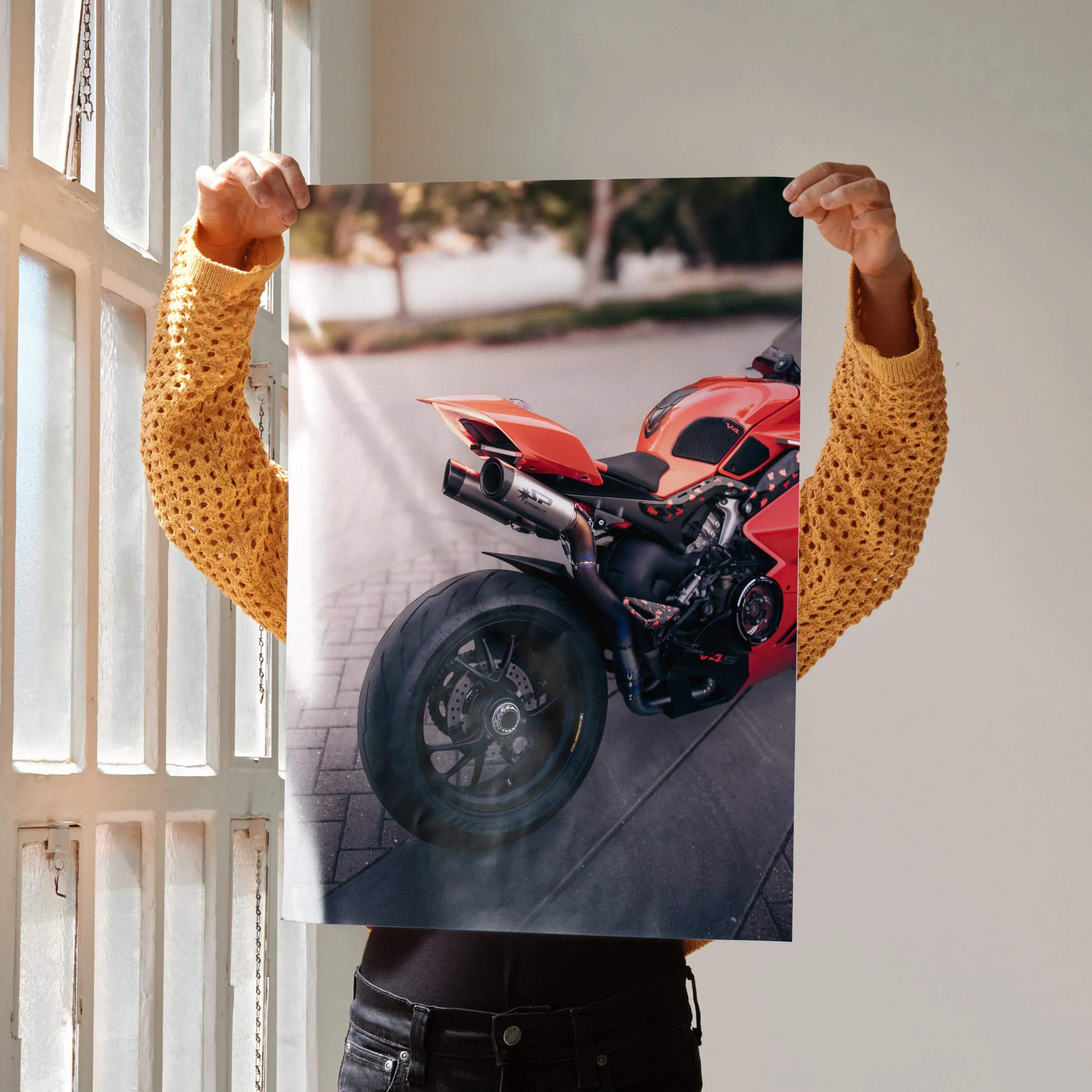 Vibrant red ducati panigale v4s motorcycle poster showing sleek design and detailed engine components