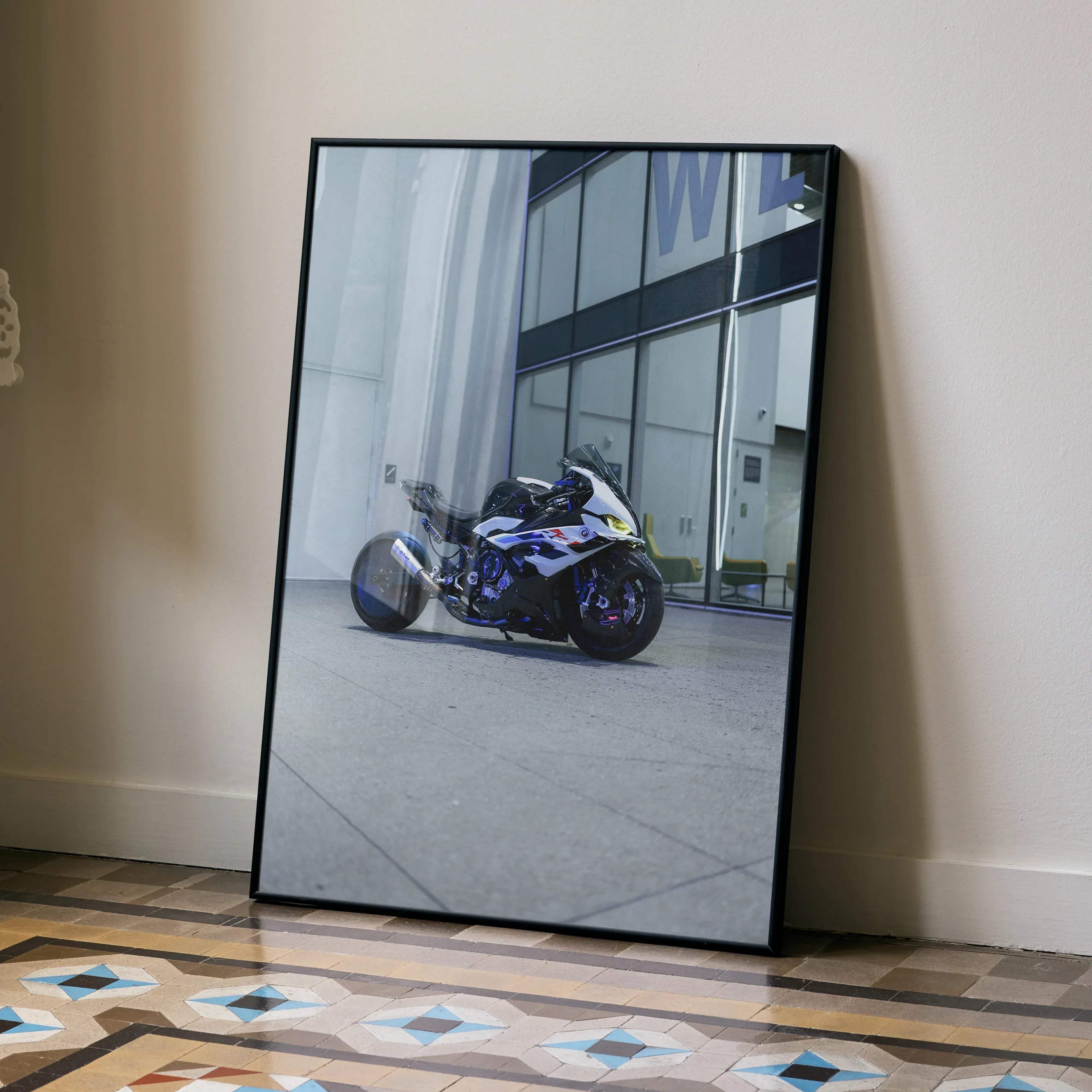 Black-framed photograph of a white and blue bmw s1000rr motorcycle art print high quality wall decor