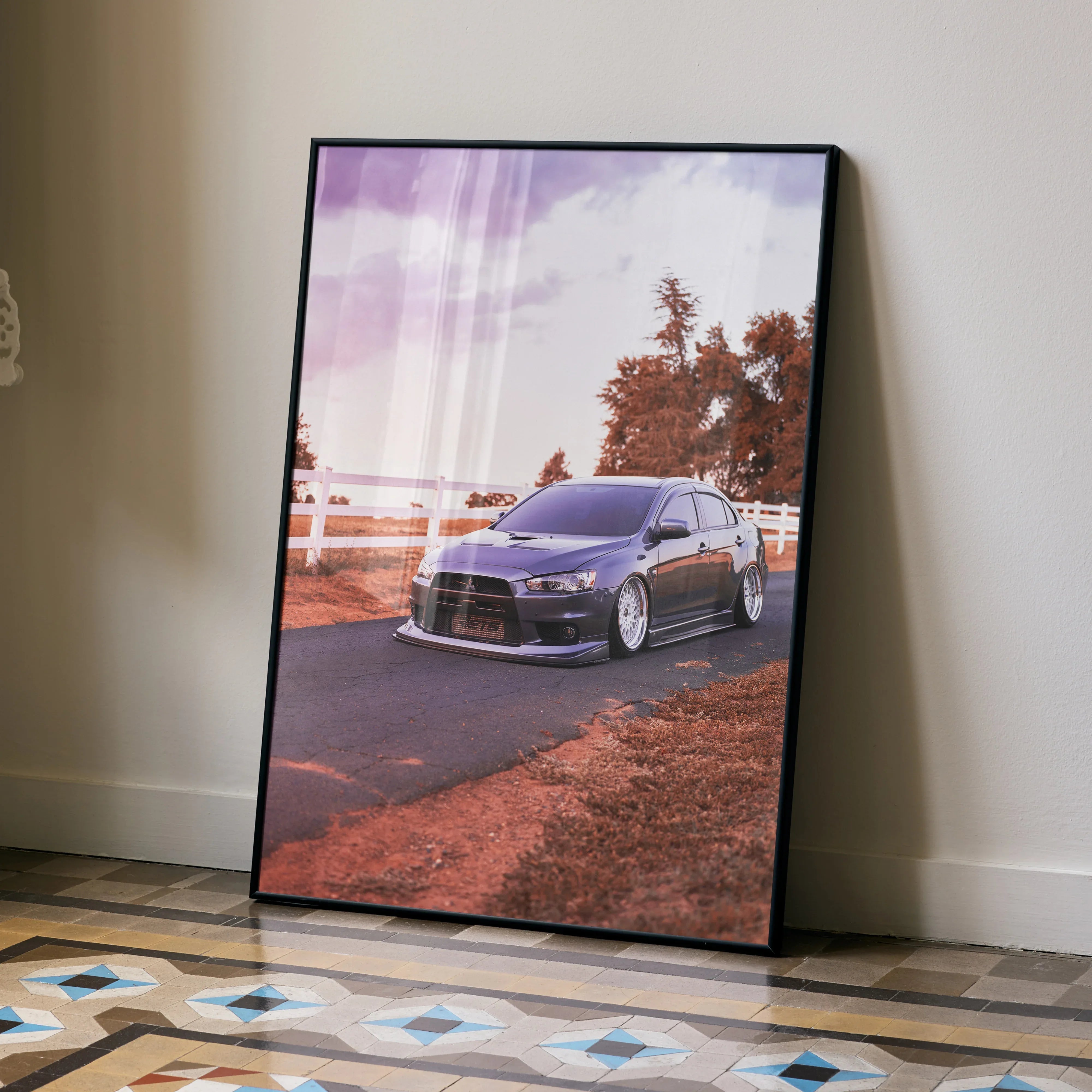 Mitsubishi Evo 10 poster with purple sports car on road against sunset sky wall art.
