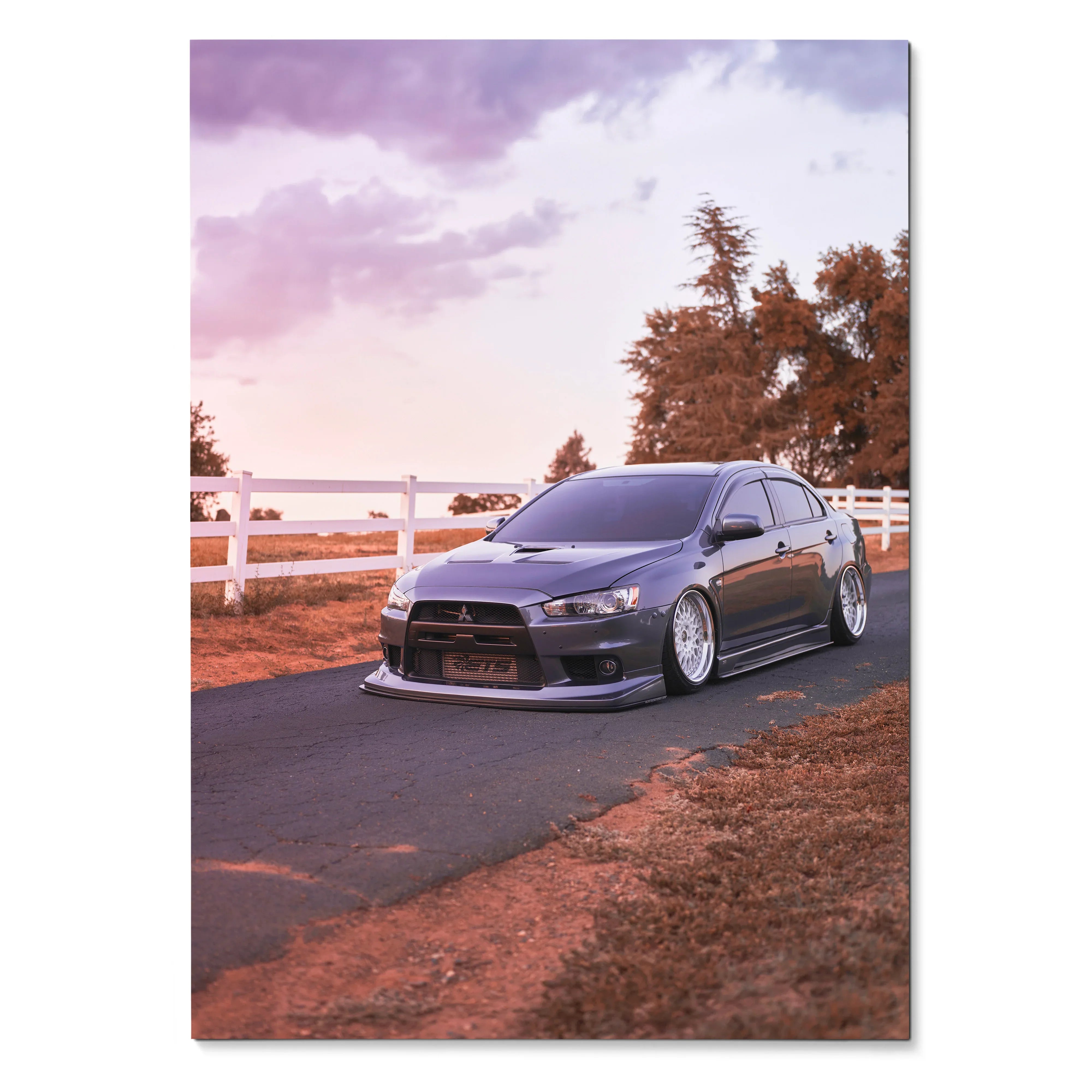 Mitsubishi Evo 10 parked on country road under purple sky poster wall art.