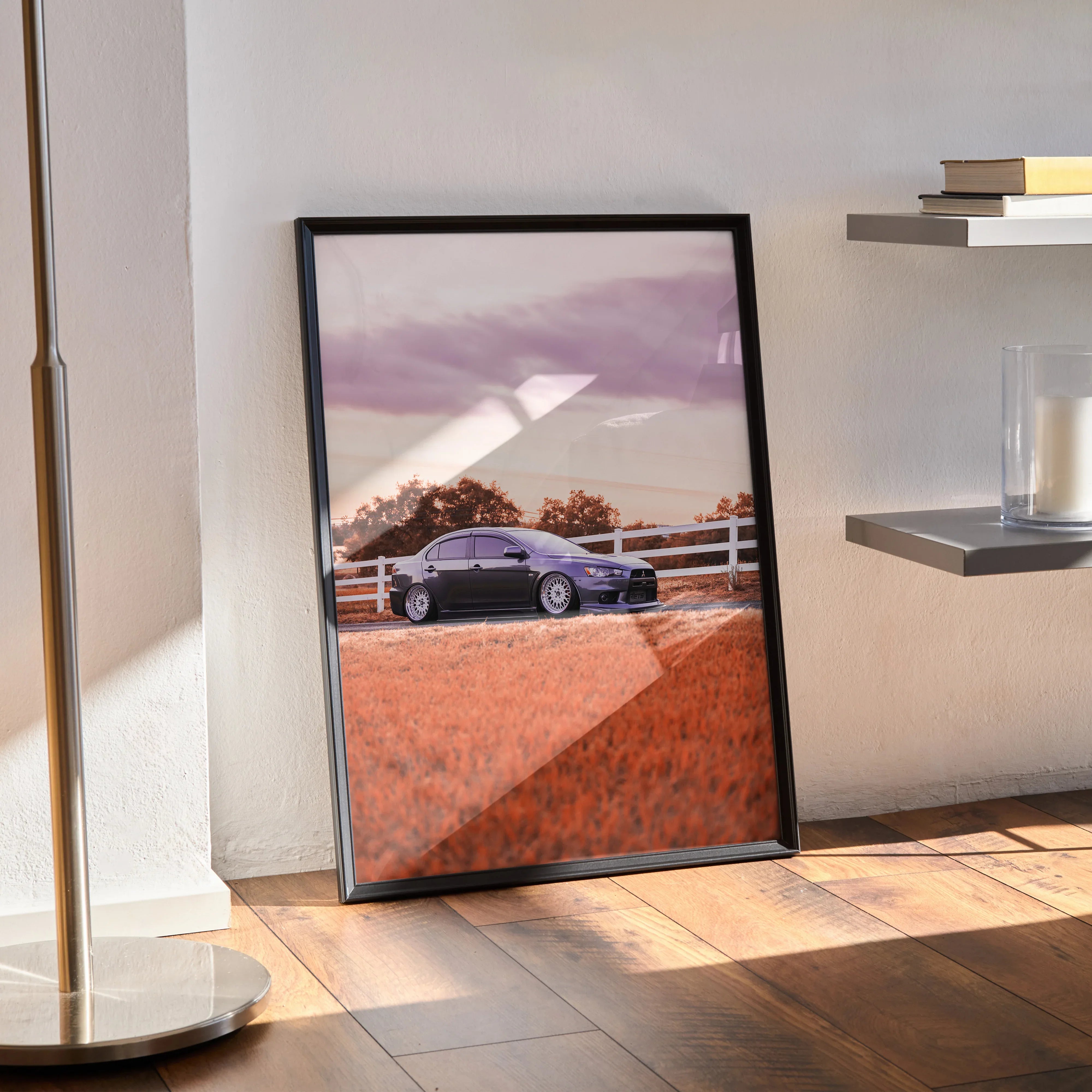 Mitsubishi Evo 10 car poster in black frame with purple sky and orange grass wall art.