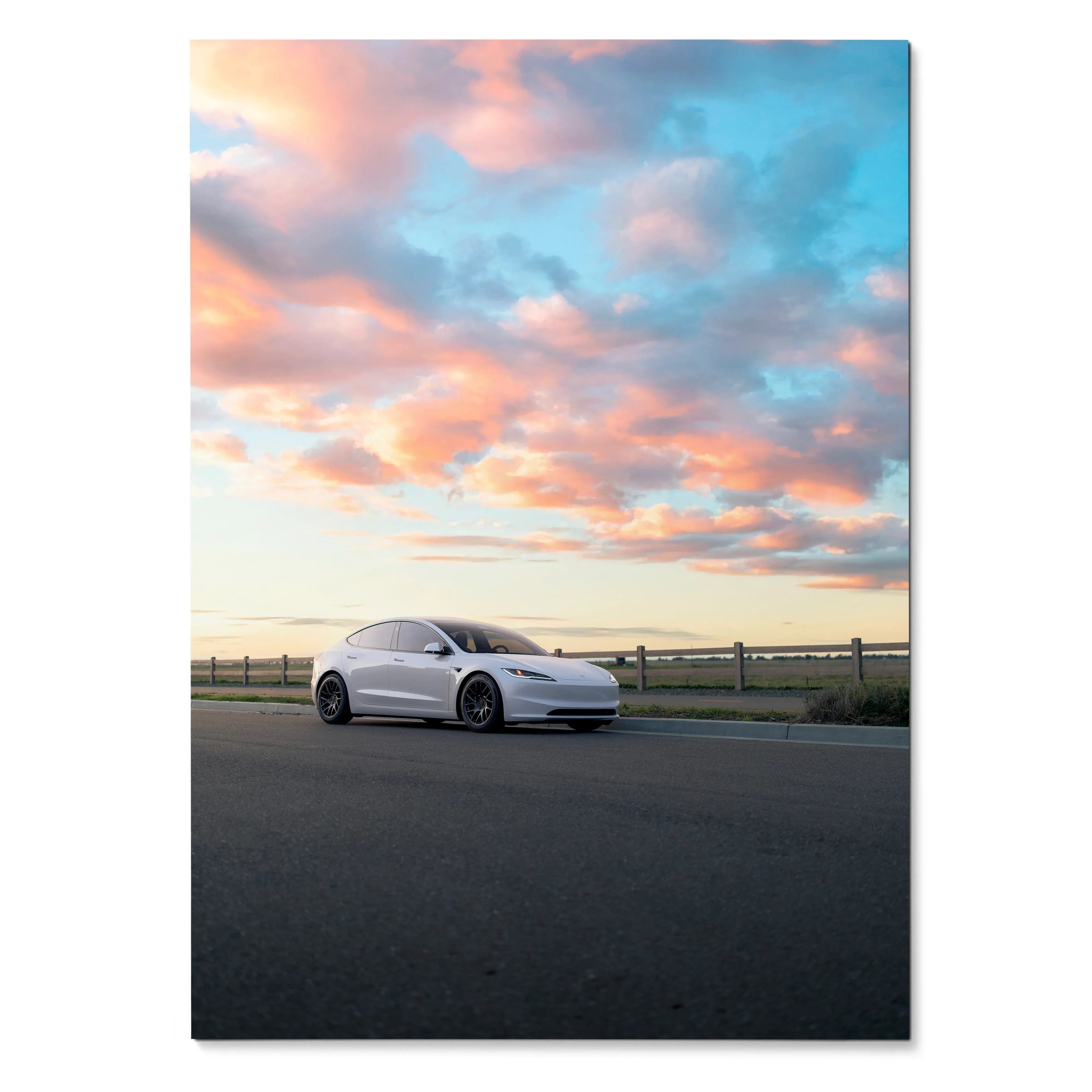 Tesla Model 3 Highland parked on road at sunset with colorful clouds, poster wall art.