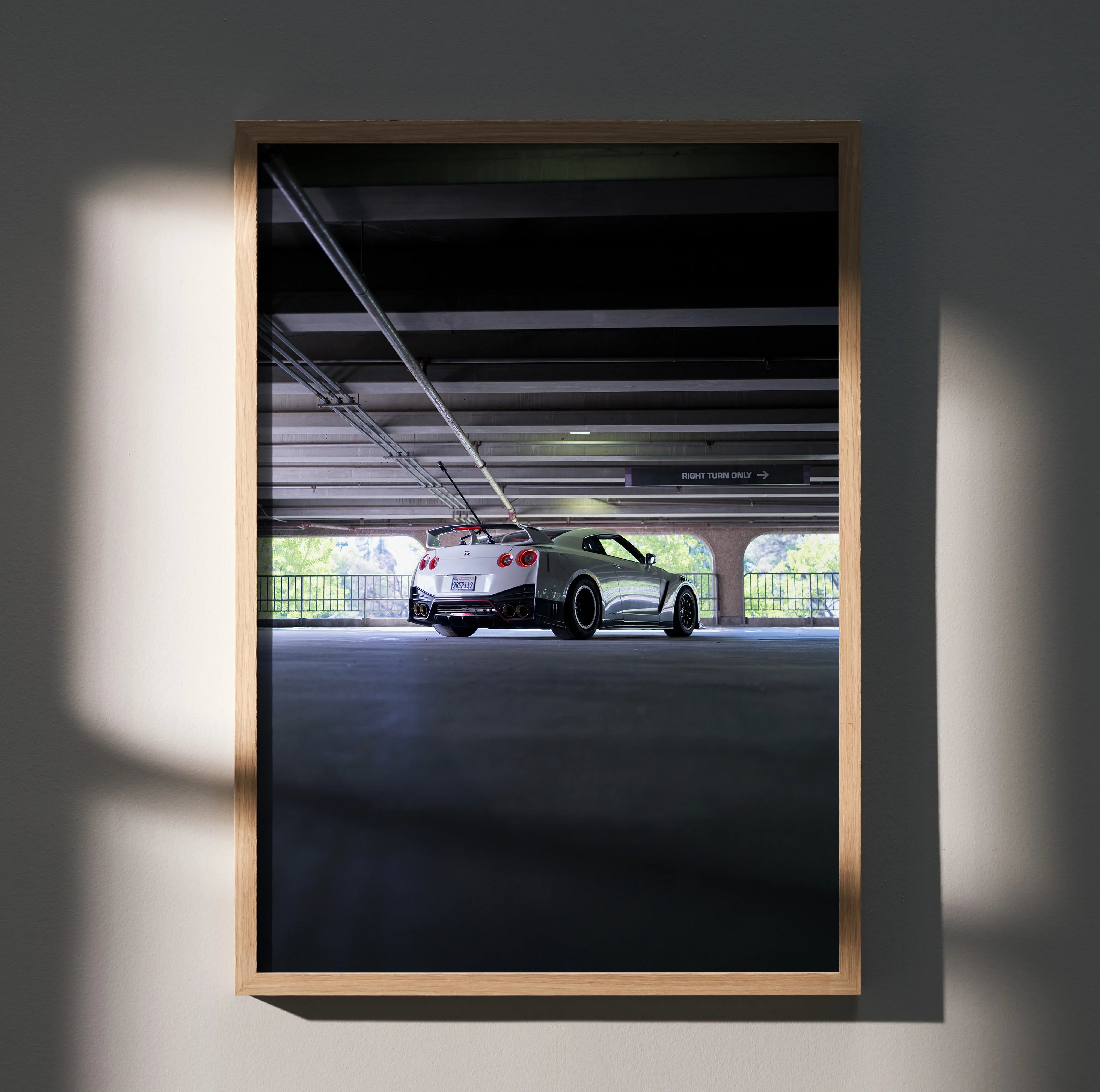 Nissan GTR R35 parked in a dim garage, high-resolution car poster wall art.