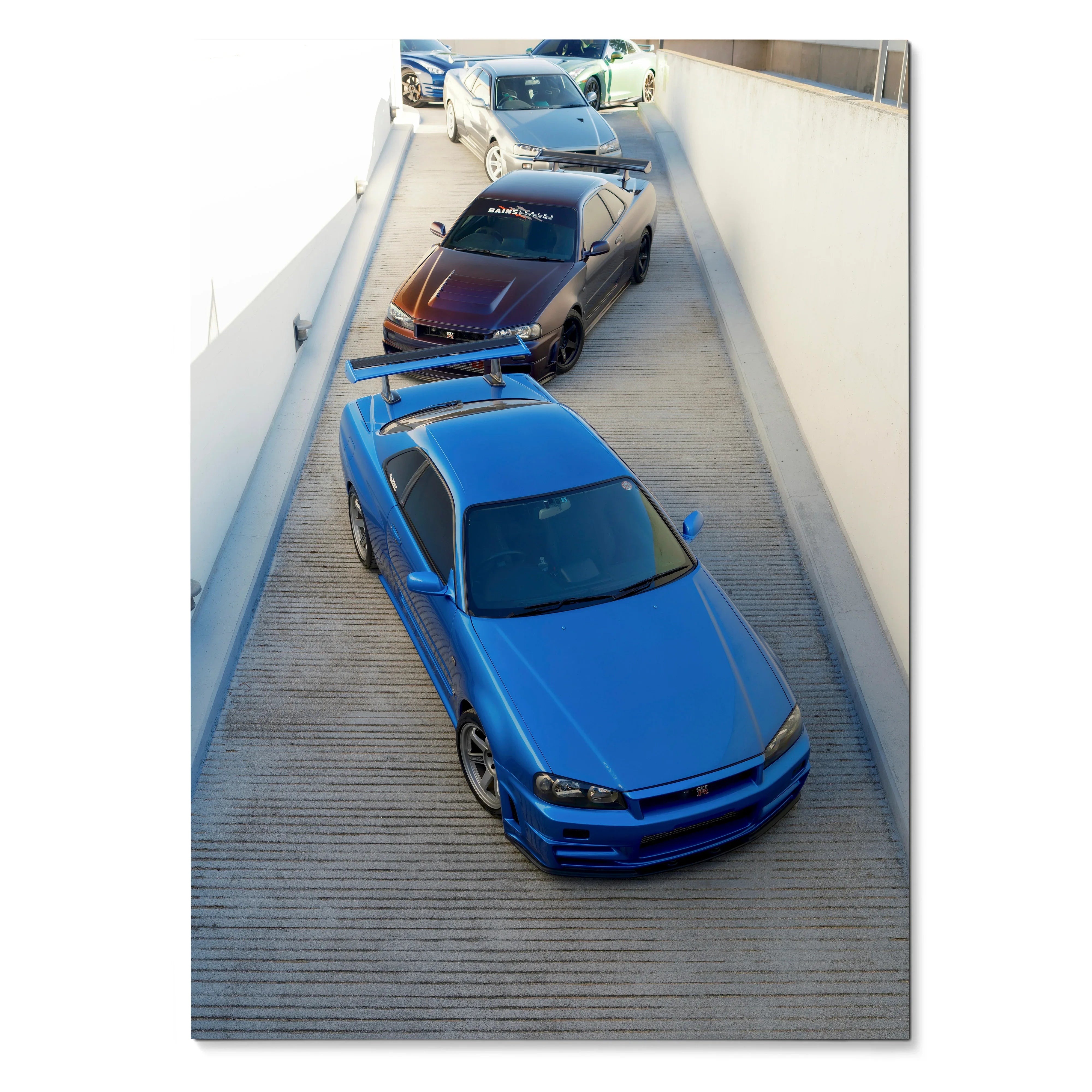 Nissan R34 GTR Skyline blue sports car poster wall art in angled overhead view.