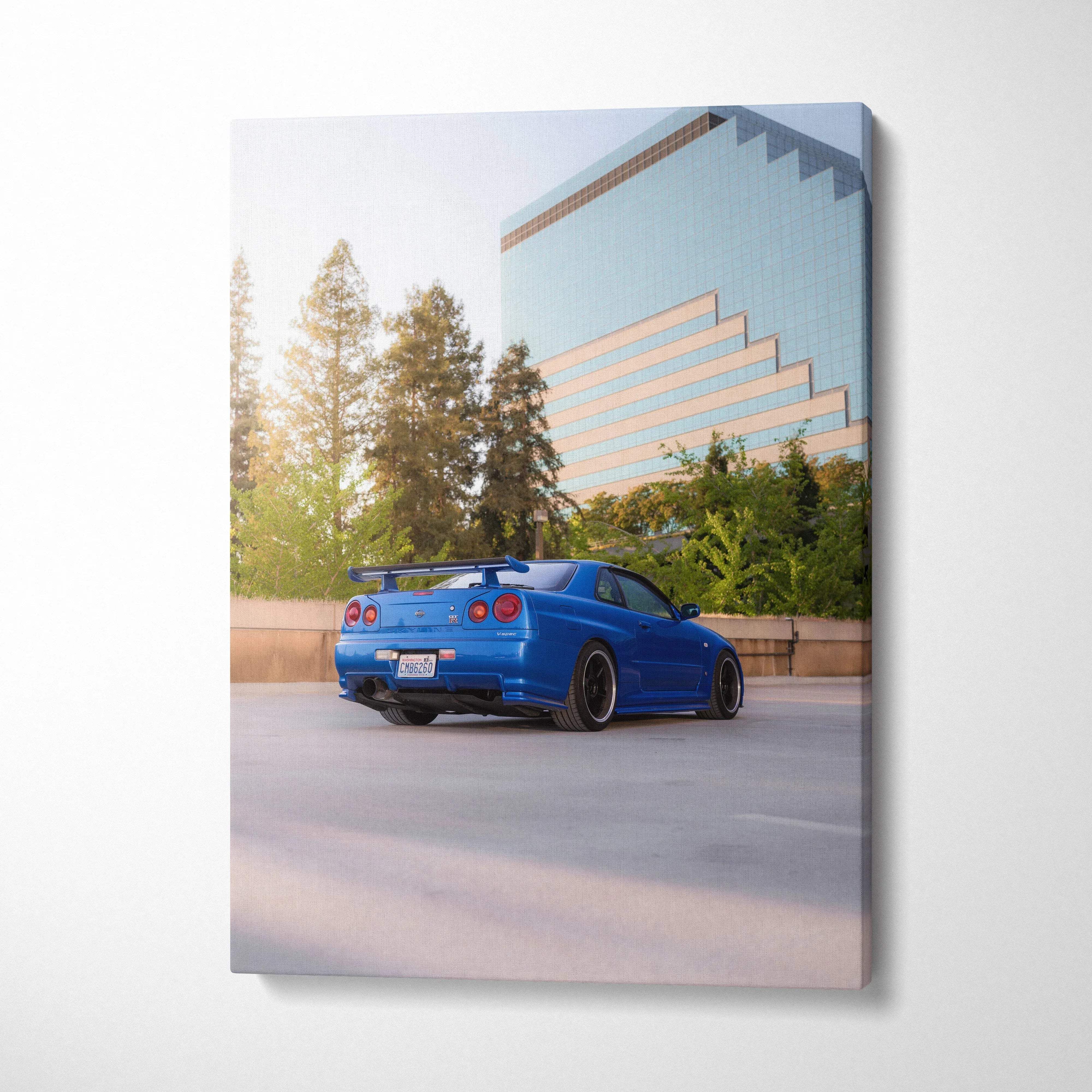 Blue Nissan GTR R34 Skyline parked by urban greenery, high resolution vertical canvas wall art.