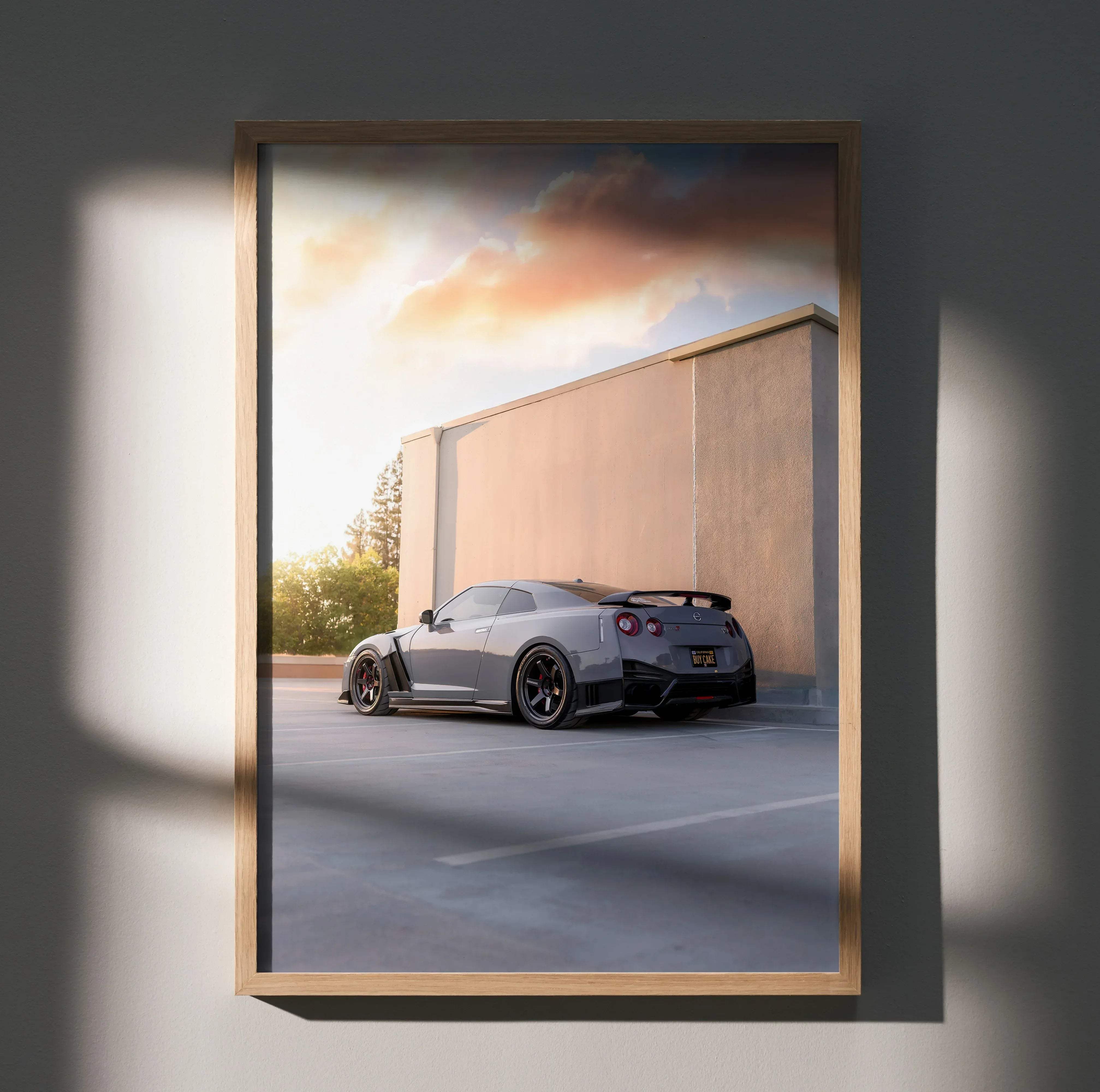 Gray Nissan GTR R35 sports car poster in a light wood frame high resolution for wall decoration