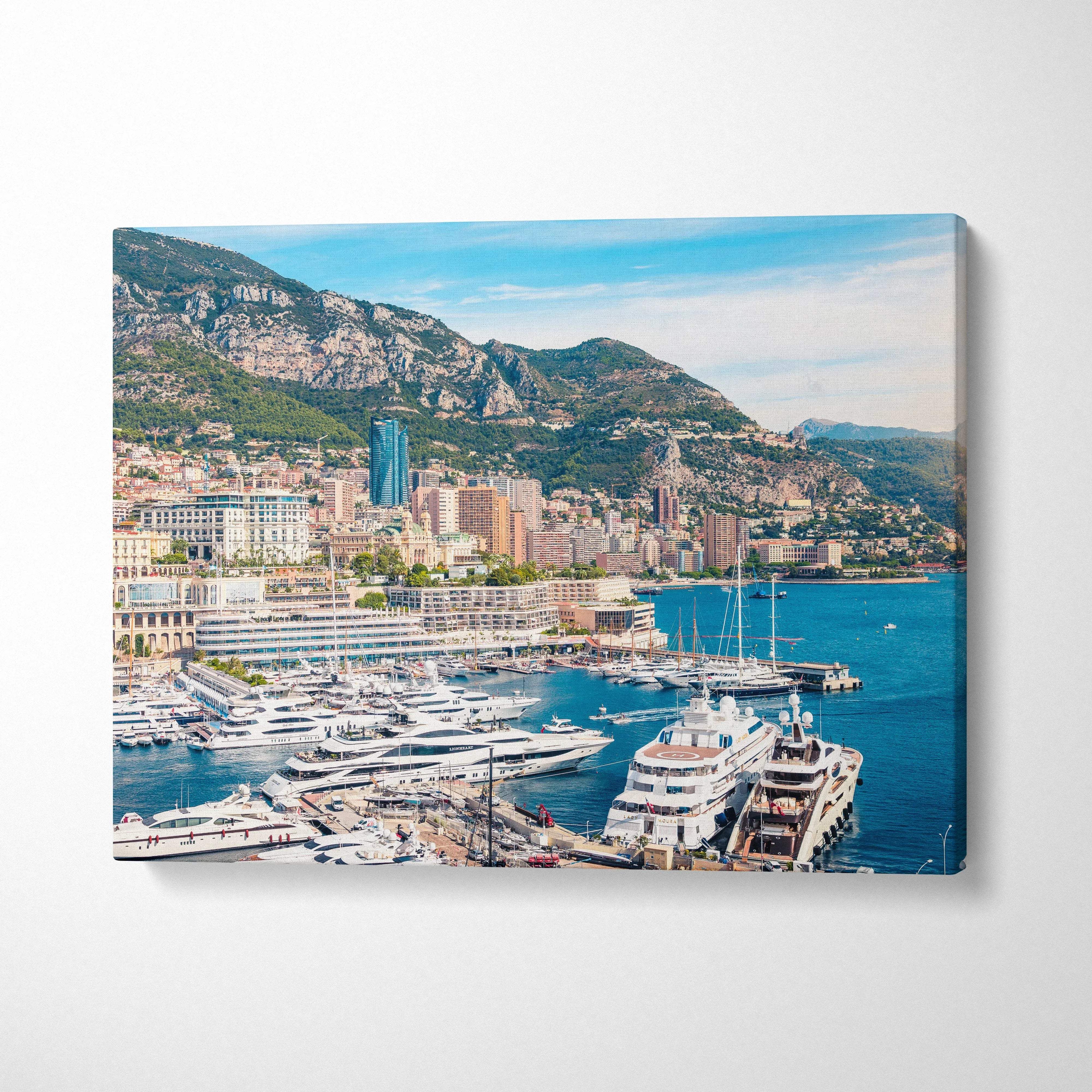 Canvas wall art featuring a detailed harbor scene with yachts and coastal buildings under a sunny sky.