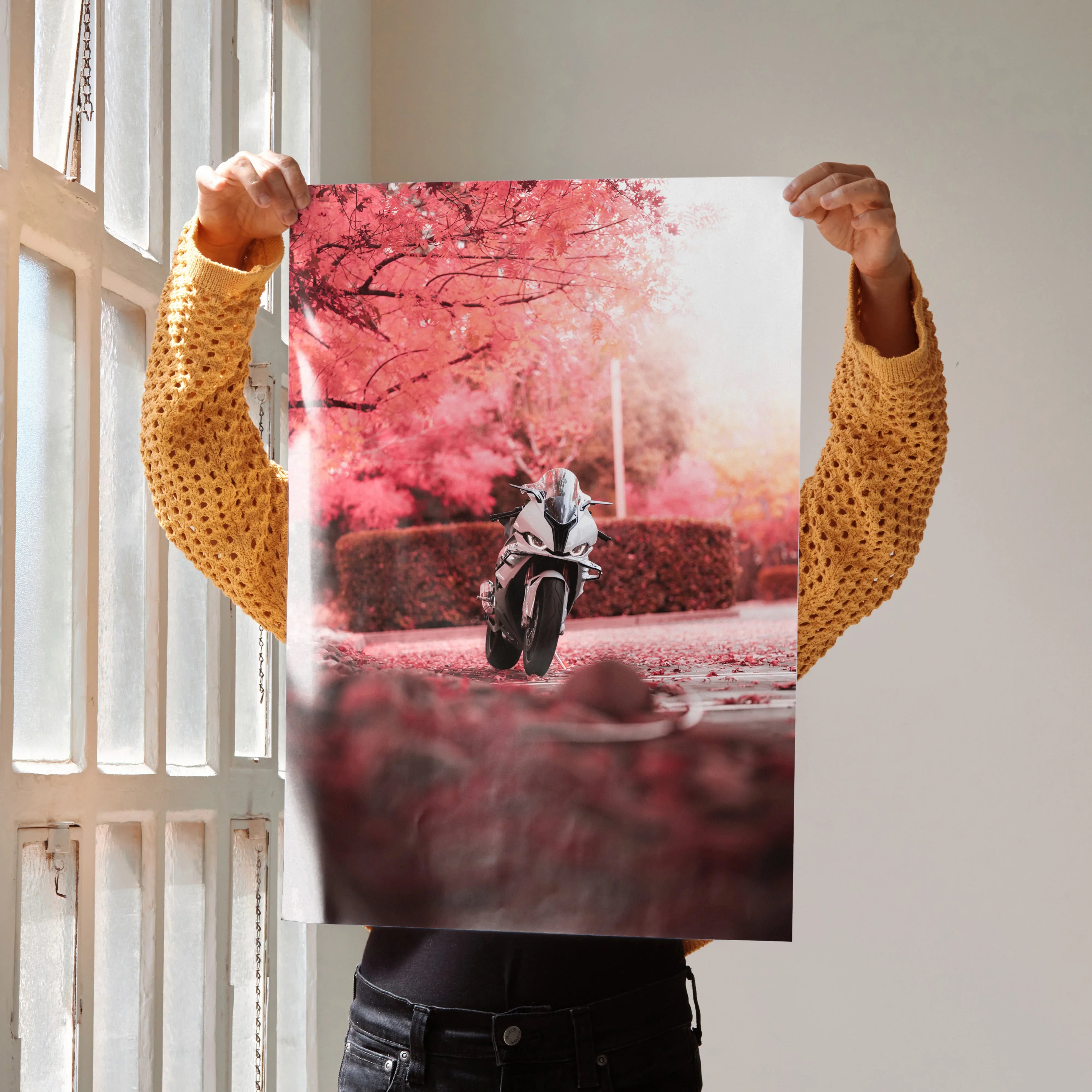 BMW S1000RR motorcycle poster with pink cherry blossom tree background, wall art for enthusiasts.