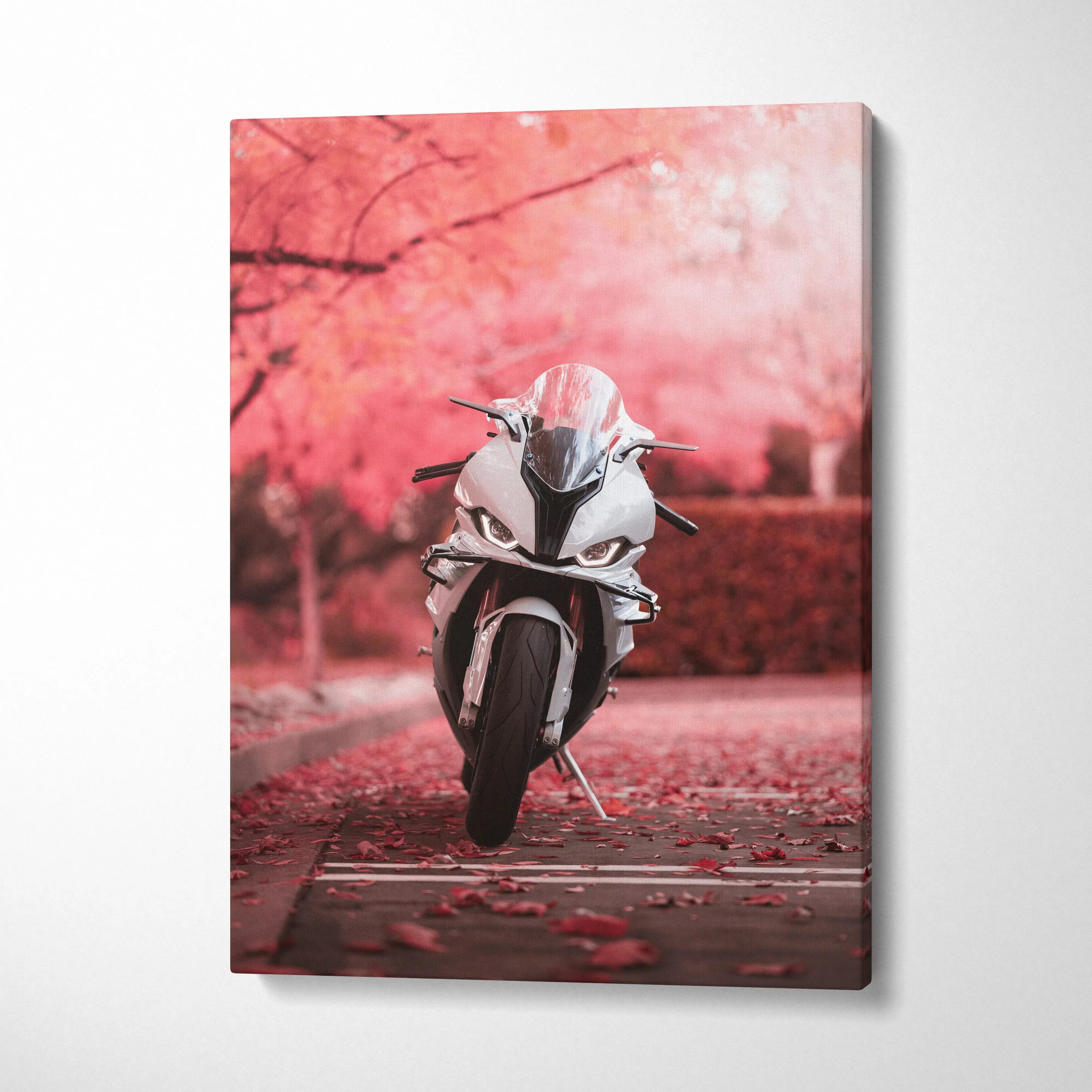Canvas art of BMW S1000RR motorcycle in front of pink blossoming trees, vertical wall art.
