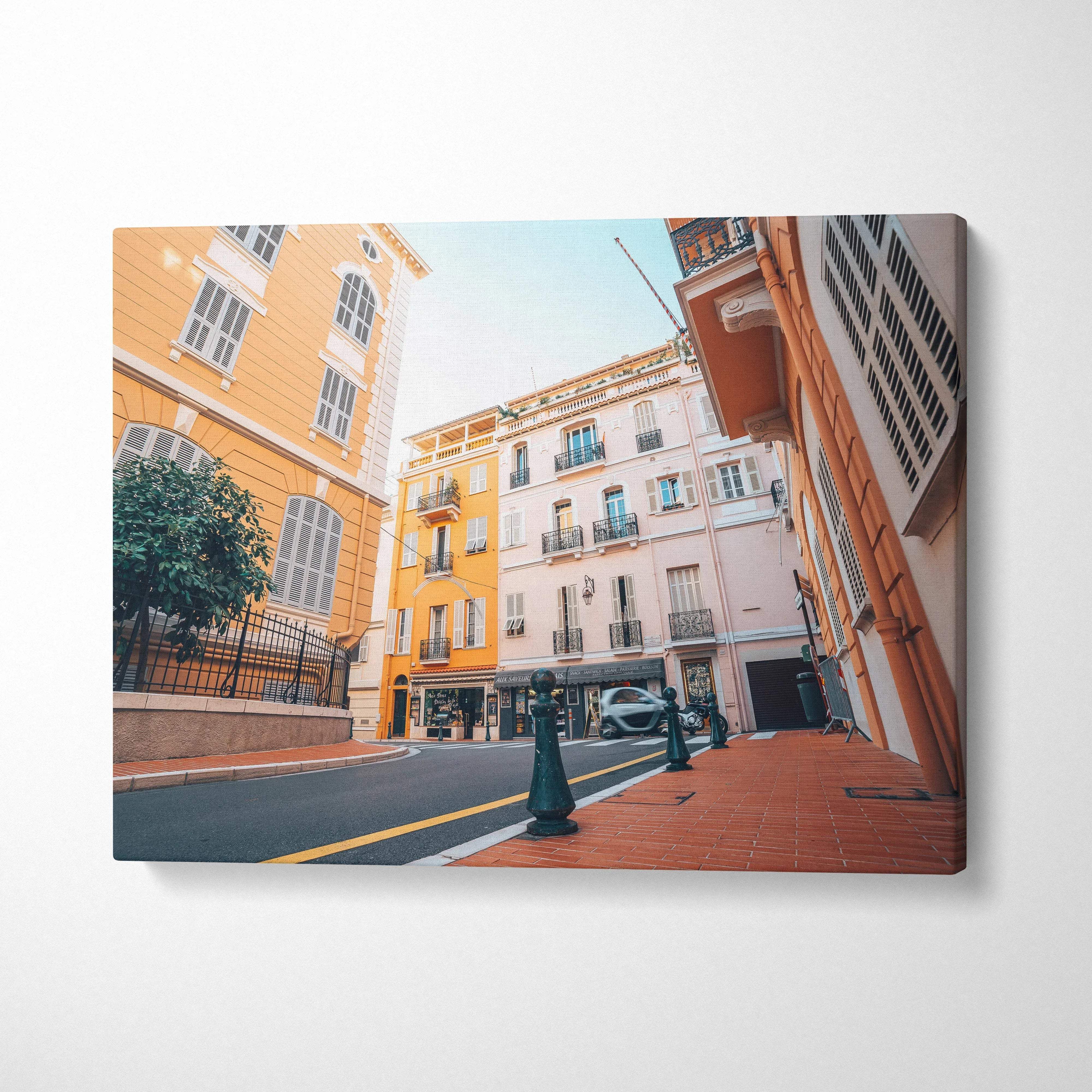 Canvas art wall print featuring exquisite architecture of colorful city buildings under a bright sky.
